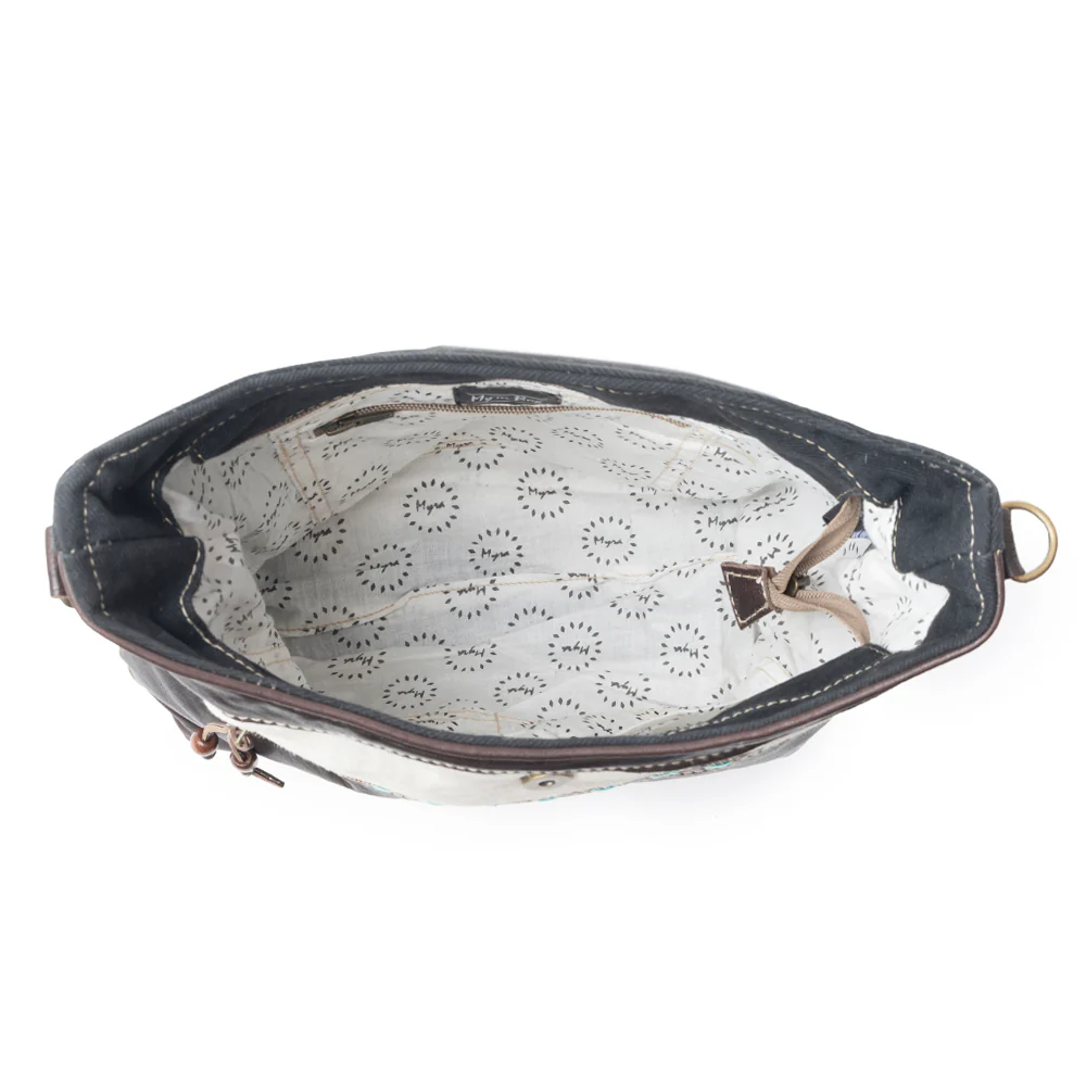 11264-rusted-skies-hand-tooled-bag-1.webp