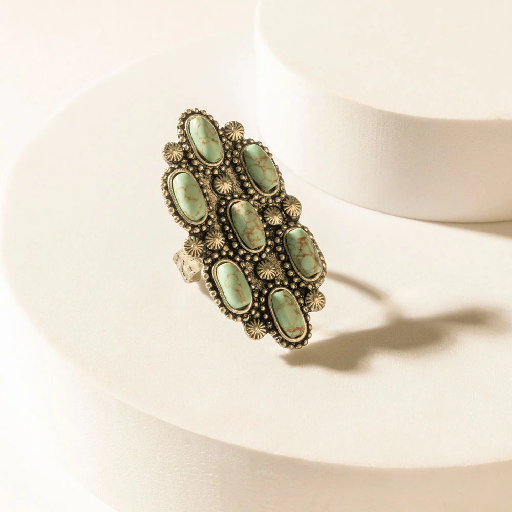 Seven Stones of the West Ring in Canyon Teal
