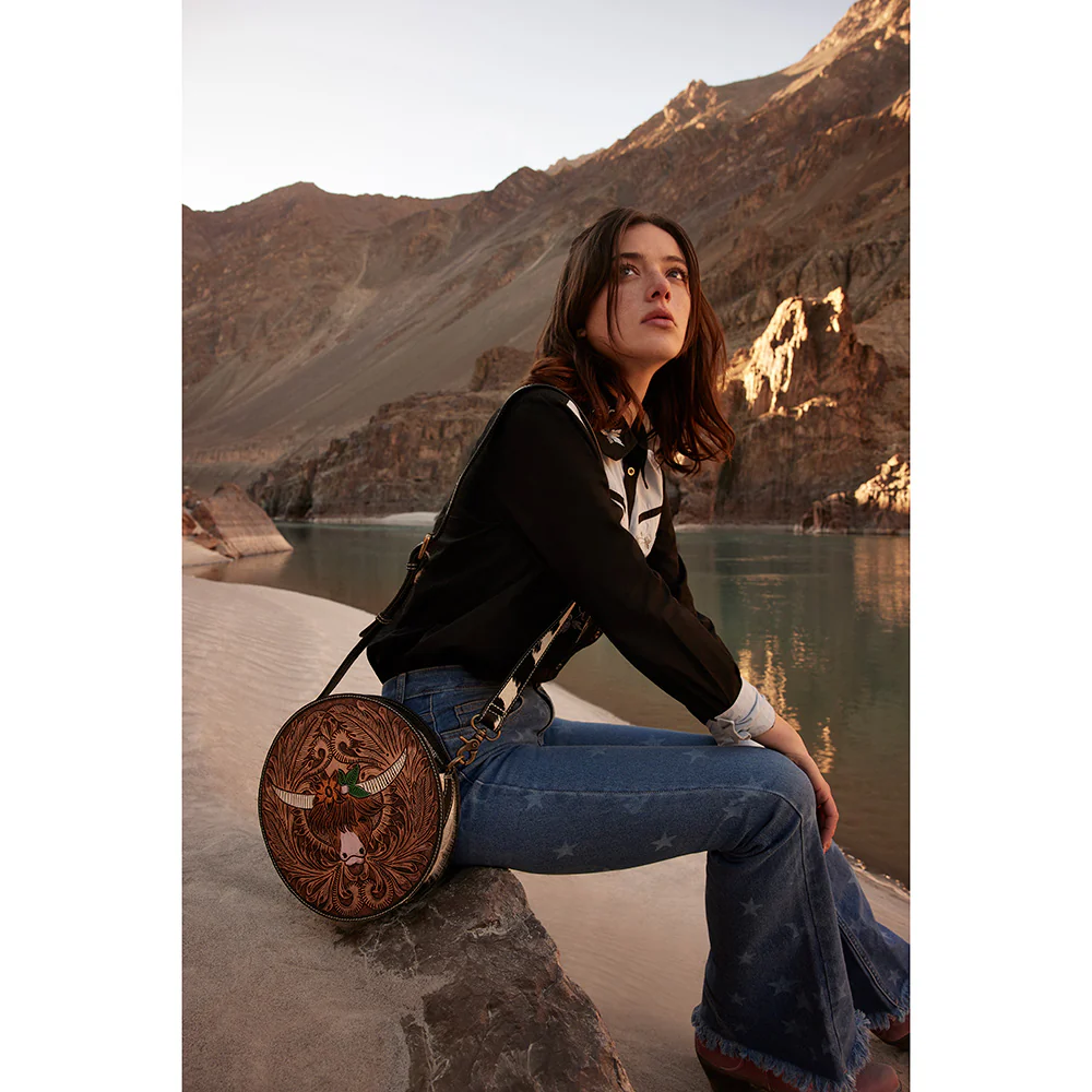 1180-bloomin-steer-hand-tooled-round-bag-1.webp