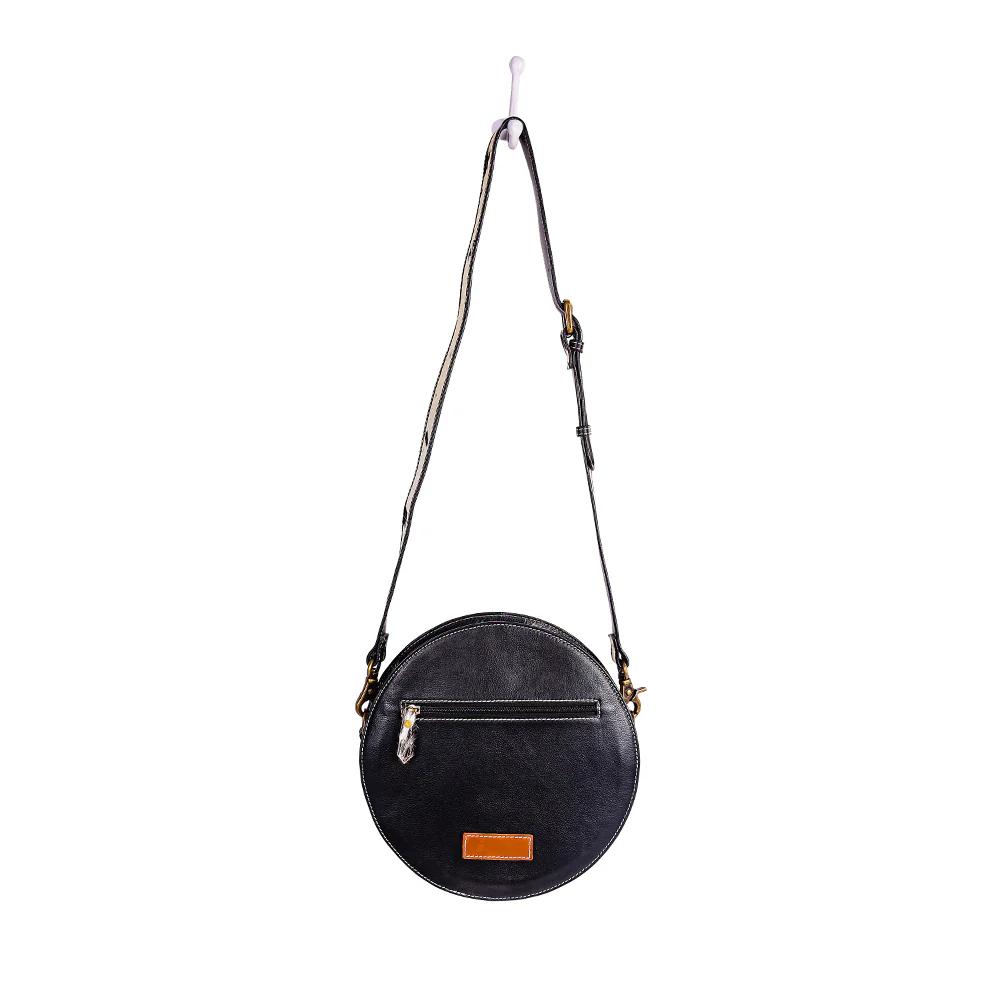 1180-bloomin-steer-hand-tooled-round-bag-1.webp