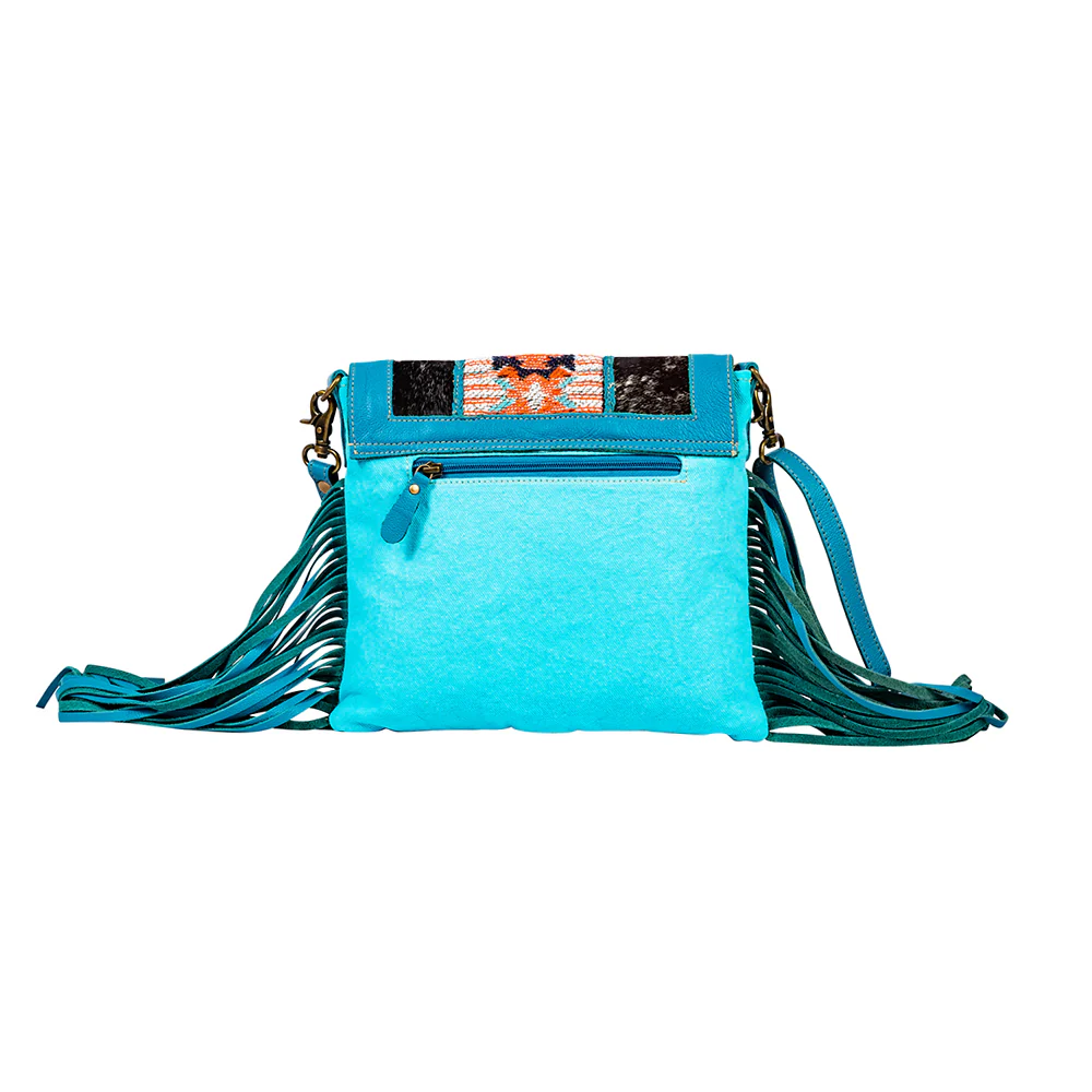 13314-tonga-ridge-canvas-hairon-bag-in-blue-1.webp