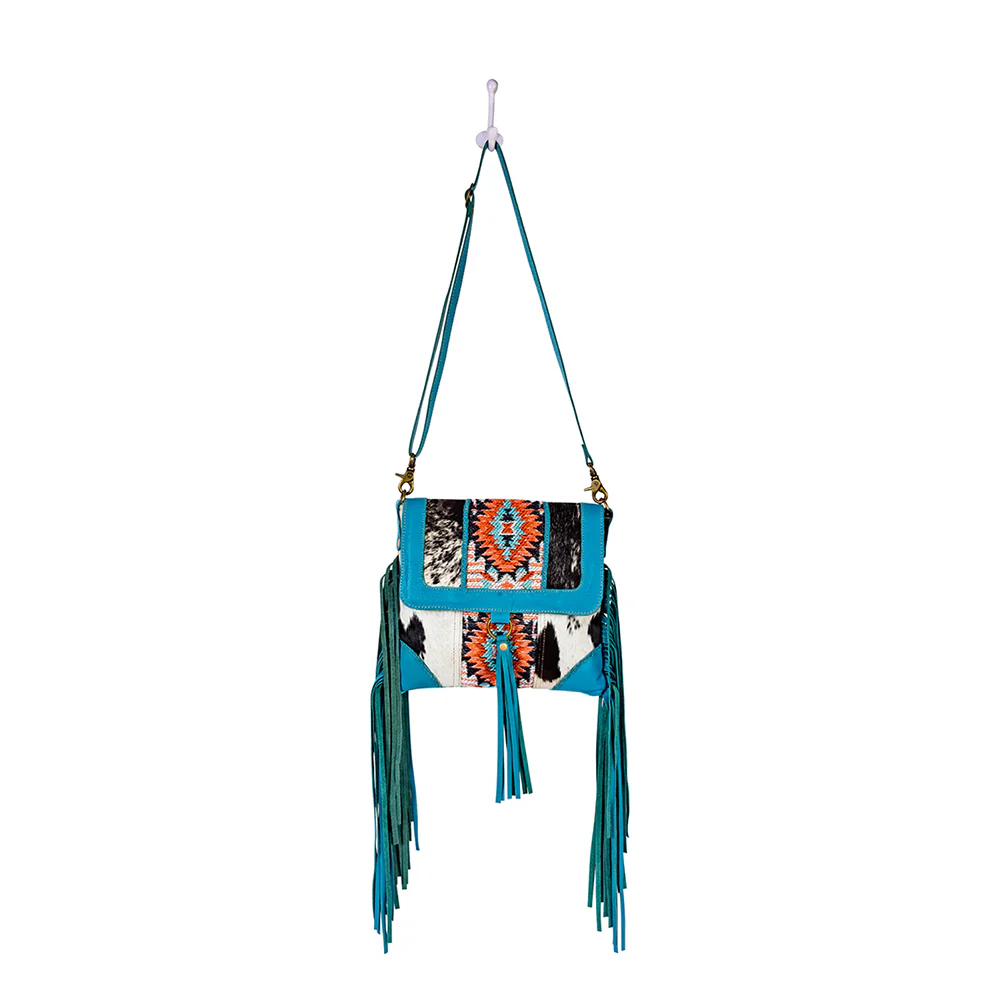 13314-tonga-ridge-canvas-hairon-bag-in-blue-1.webp