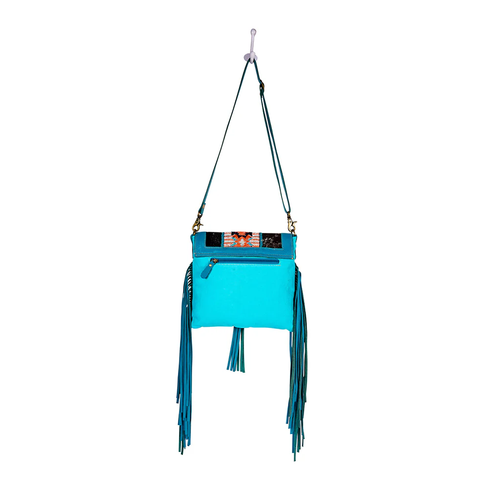 13314-tonga-ridge-canvas-hairon-bag-in-blue-1.webp
