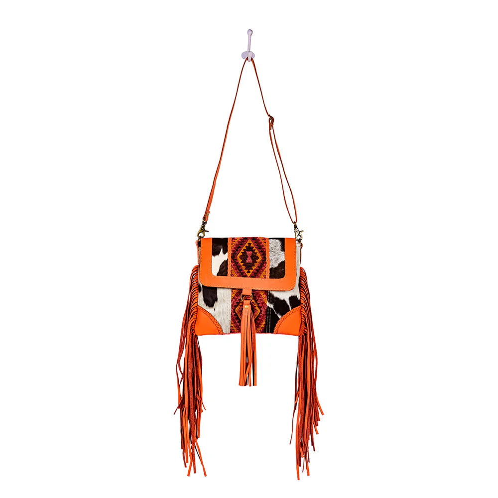 13315-tonga-ridge-canvas-hairon-bag-in-orange-1.webp