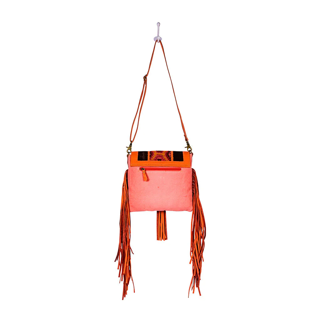 13315-tonga-ridge-canvas-hairon-bag-in-orange-1.webp