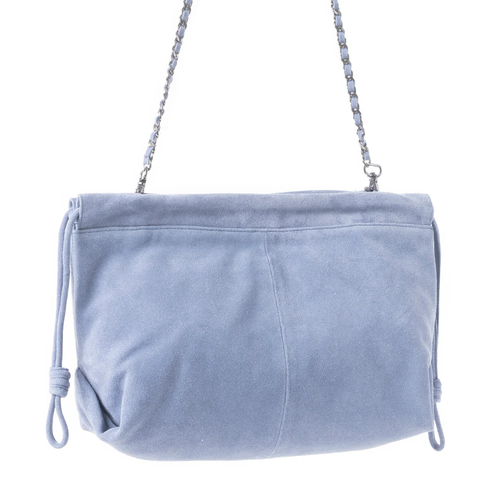 13986-wanderlust-suede-shoulder-bag-in-blue-1.webp