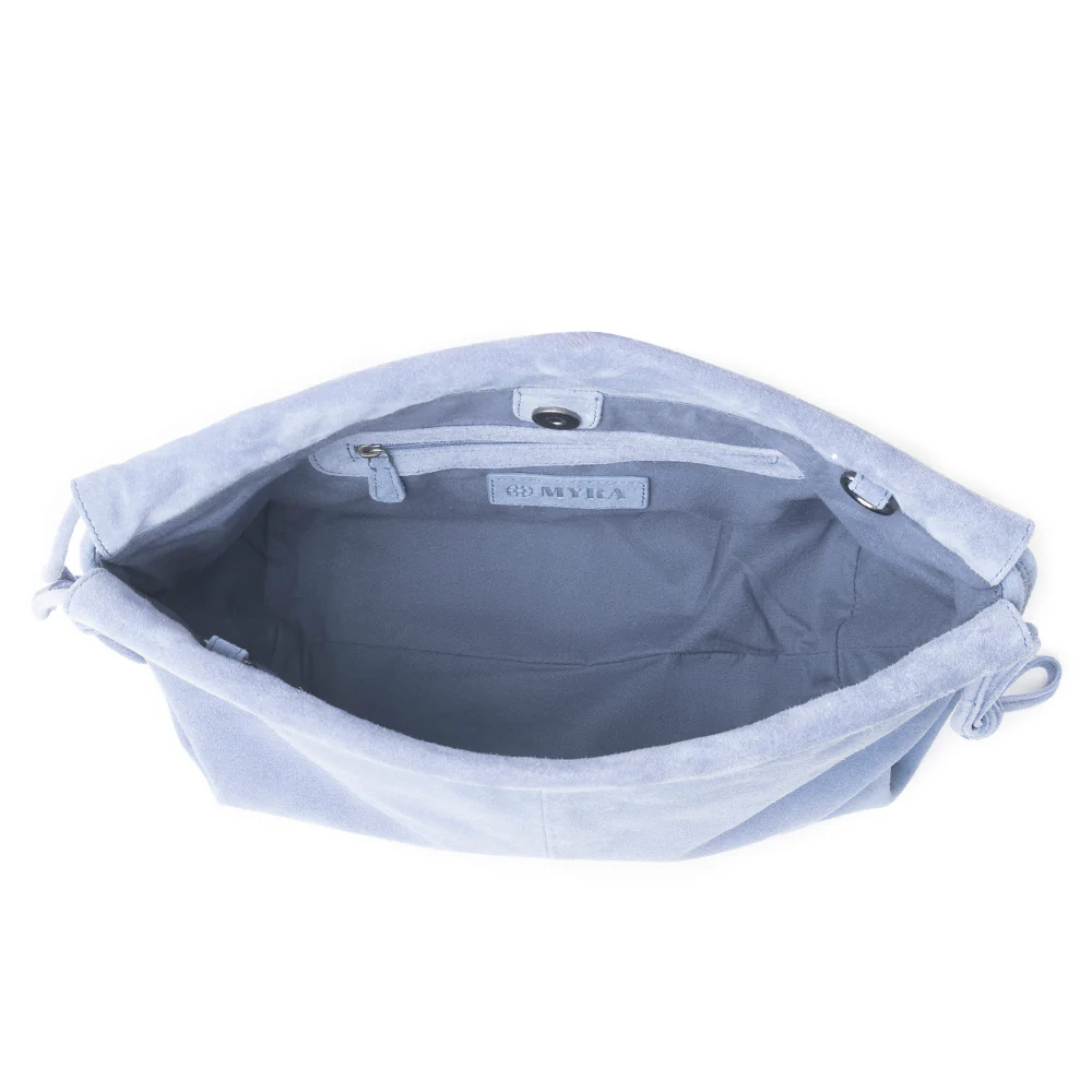 13986-wanderlust-suede-shoulder-bag-in-blue-1.webp