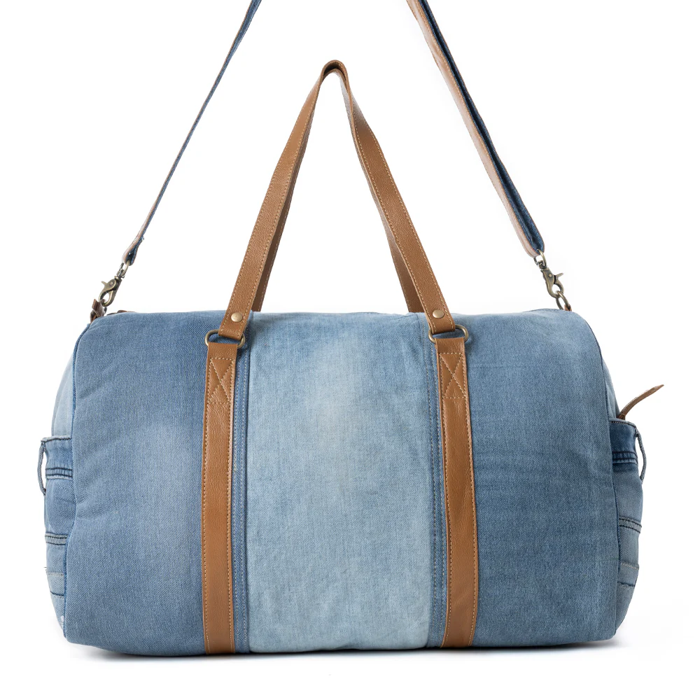 14284-wildberry-voyager-traveler-bag-in-cranberry-denim-blue-1.webp