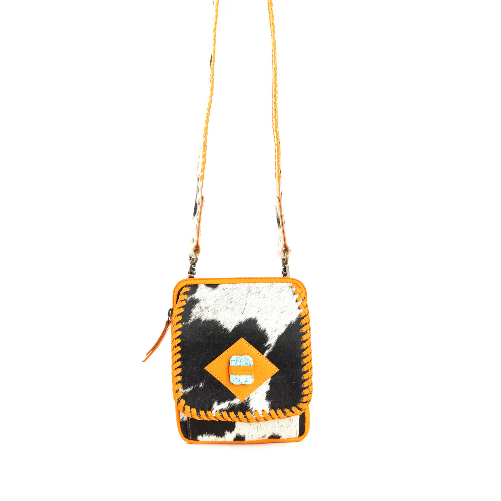 14591-yosidry-peak-leather-hairon-bag-1.webp