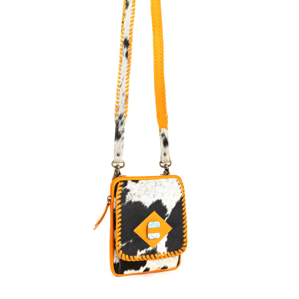 14591-yosidry-peak-leather-hairon-bag-1.webp