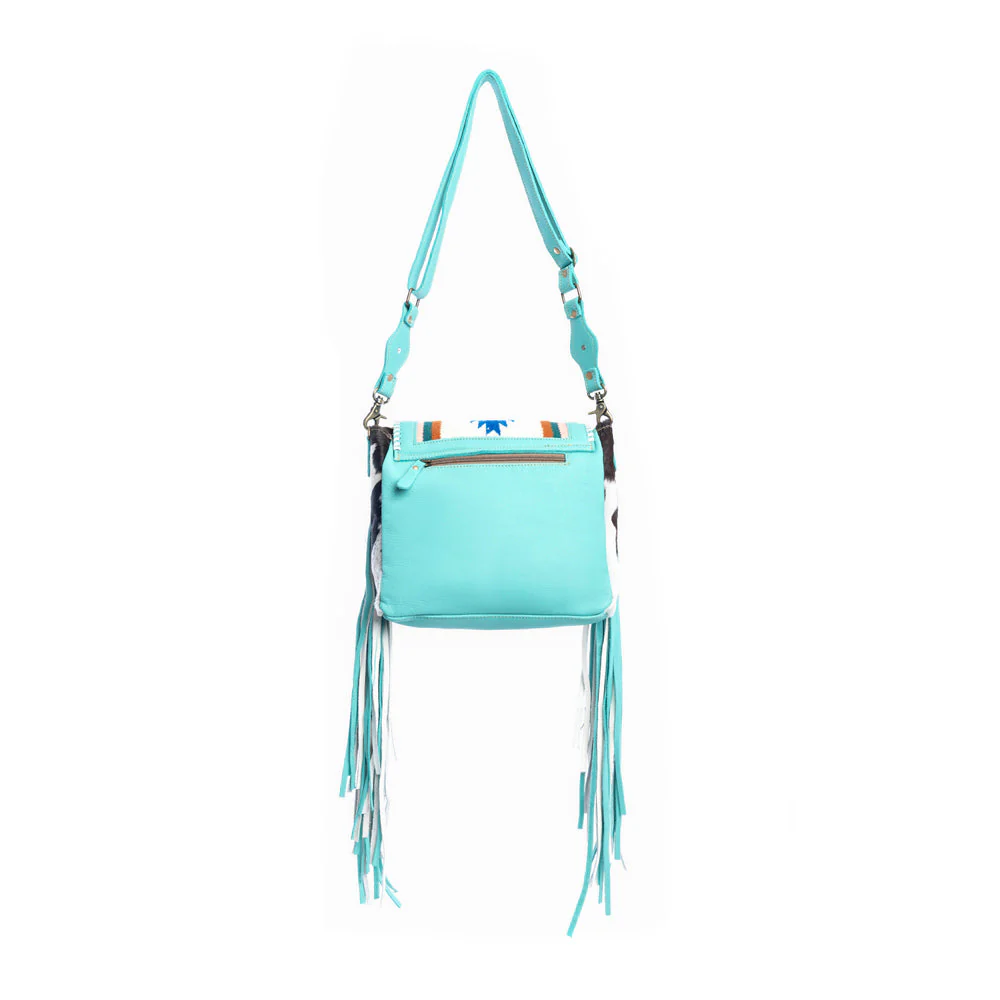 14683-zunia-leather-hairon-bag-in-turquoise-1.webp