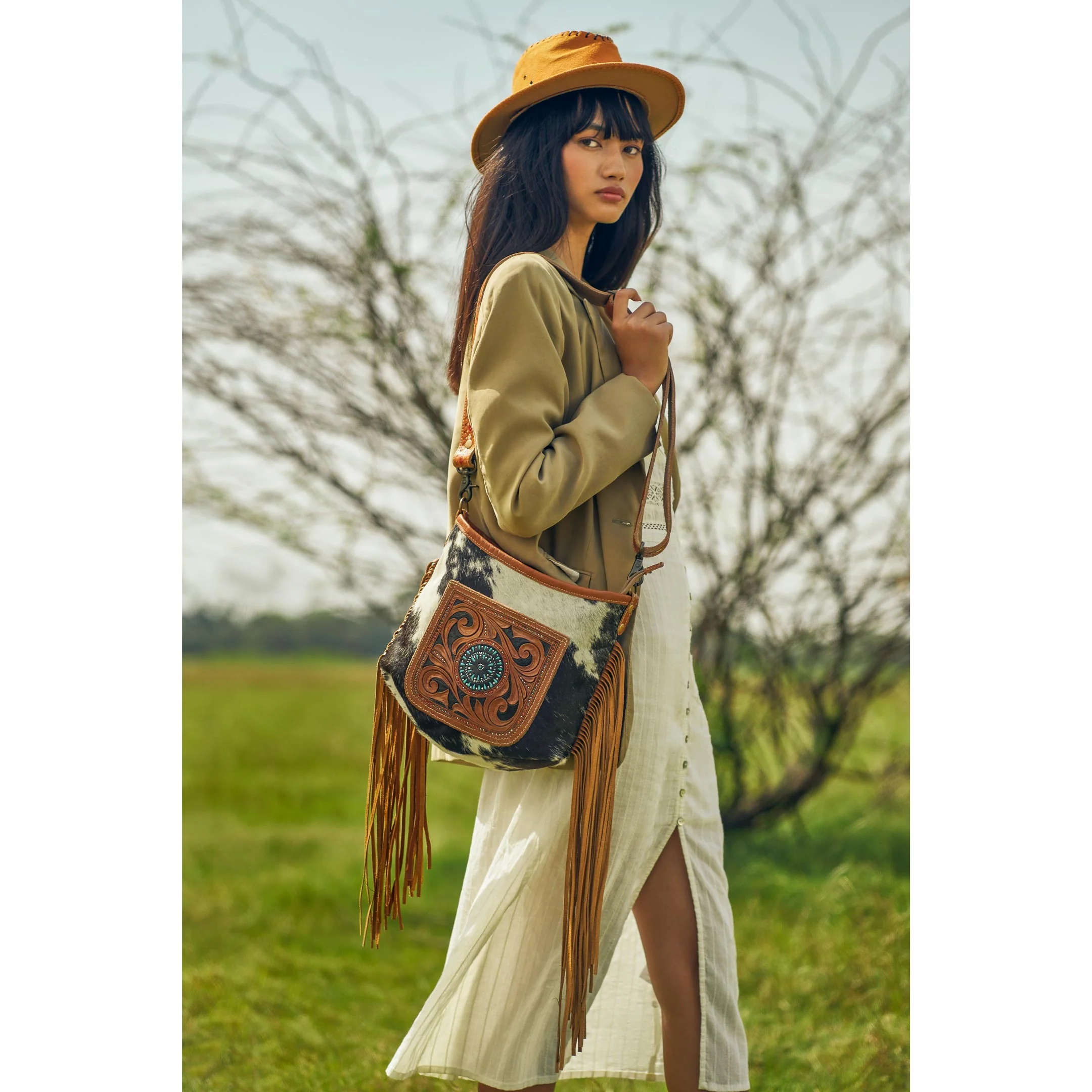 2290-brown-quilt-hand-tooled-bag-1.webp