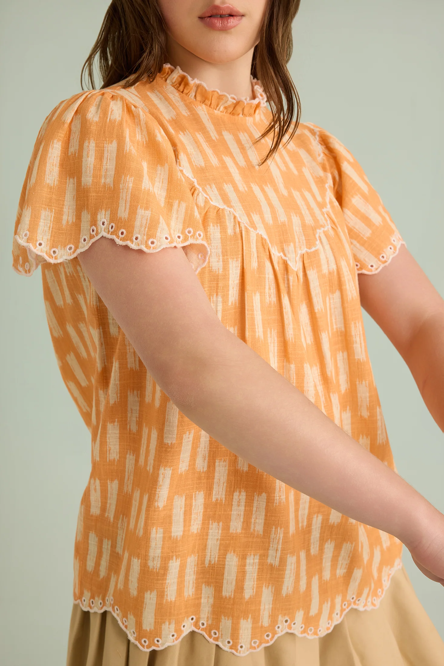 2453-callista-charm-top-in-orange-1.webp