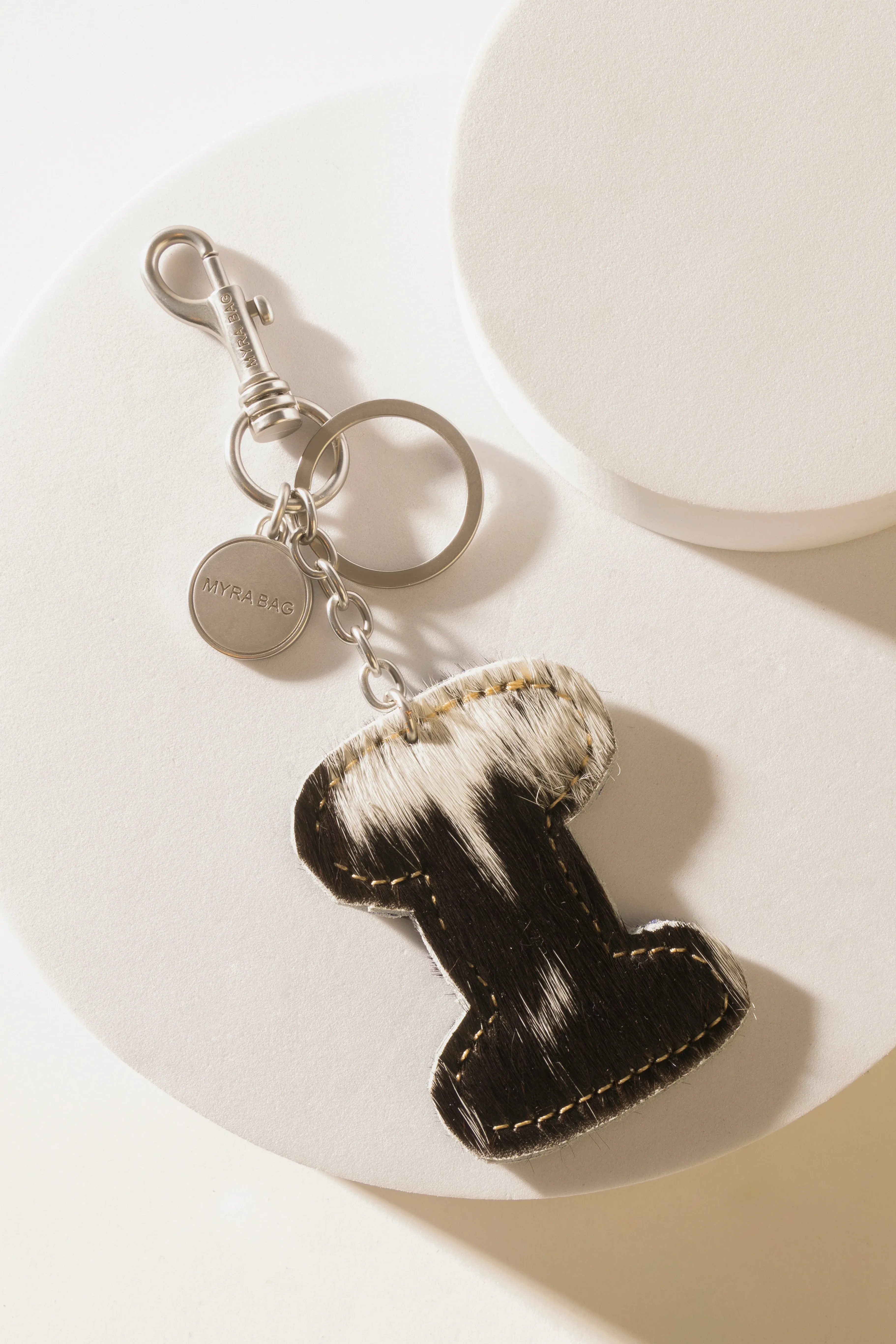 337-alpha-hairon-bag-charm-in-black-white-1.webp
