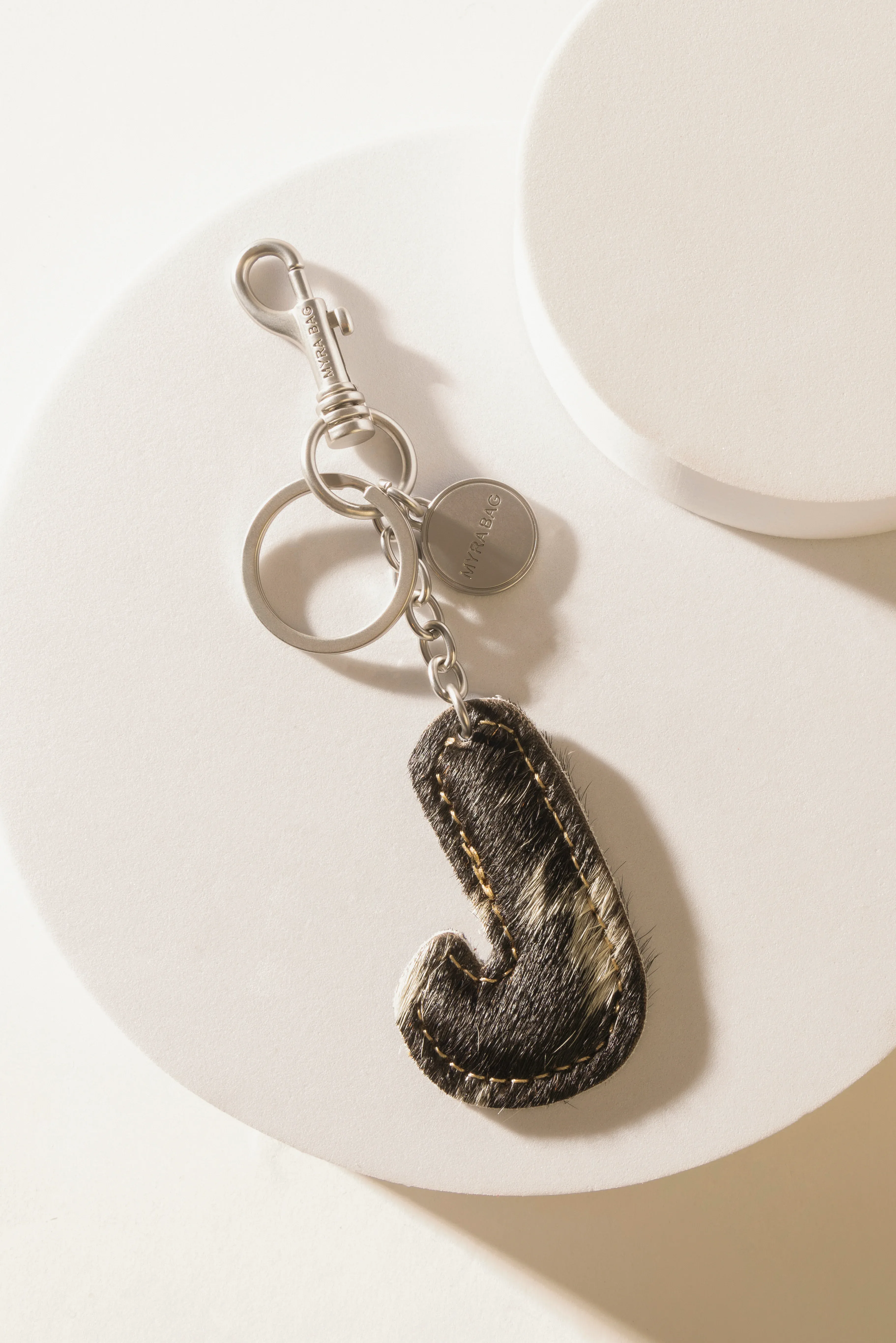 337-alpha-hairon-bag-charm-in-black-white-1.webp