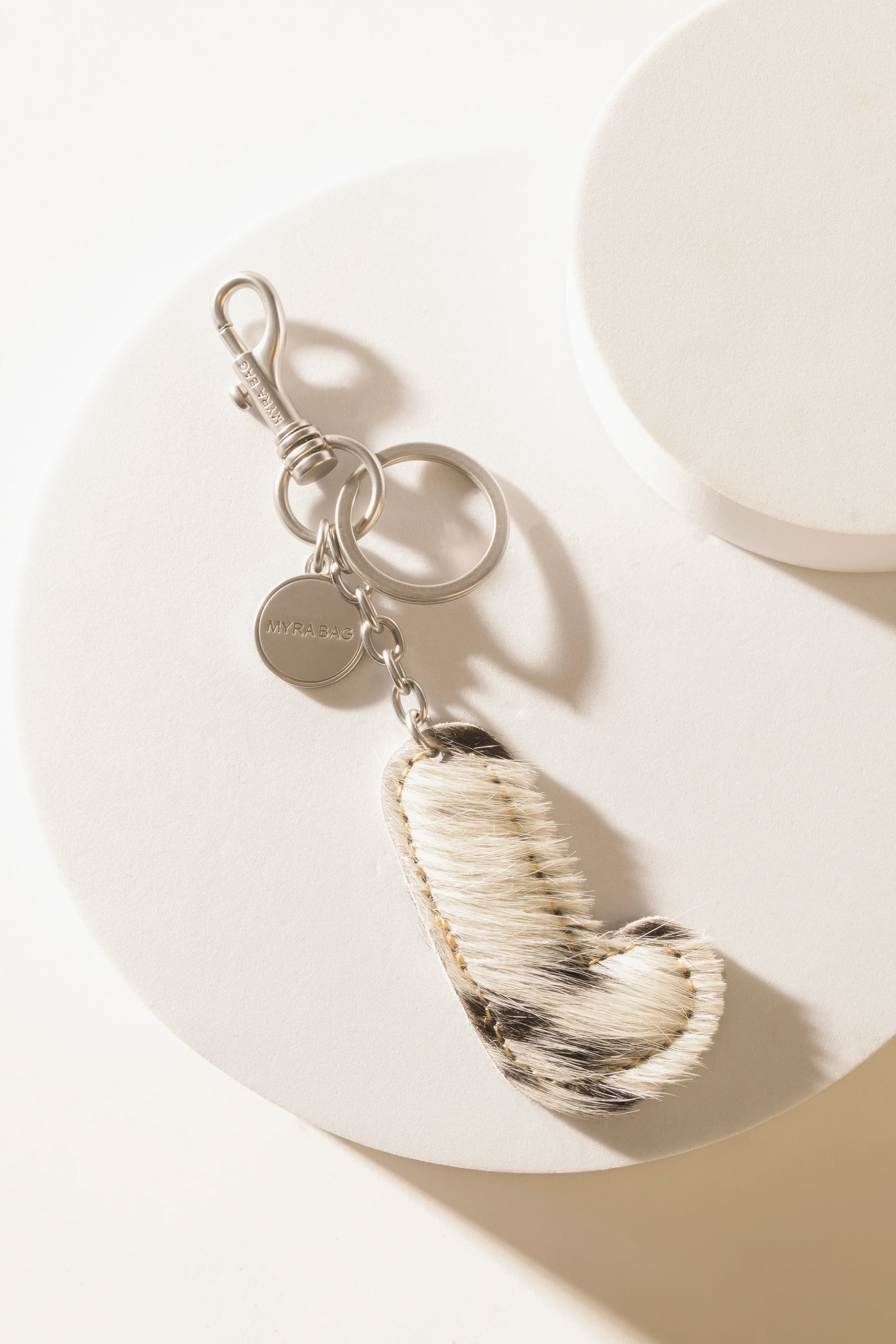 337-alpha-hairon-bag-charm-in-black-white-1.webp