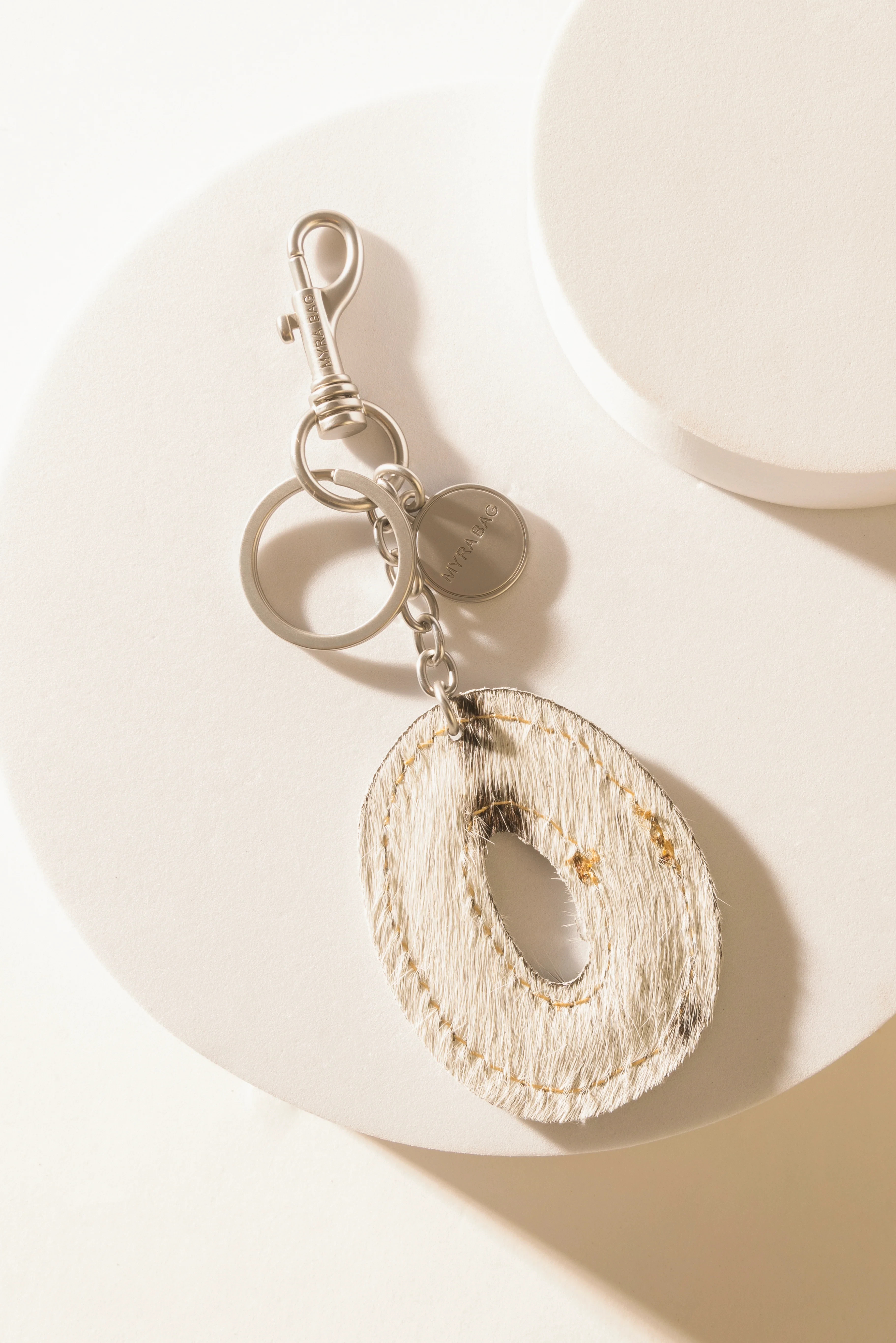 337-alpha-hairon-bag-charm-in-black-white-1.webp