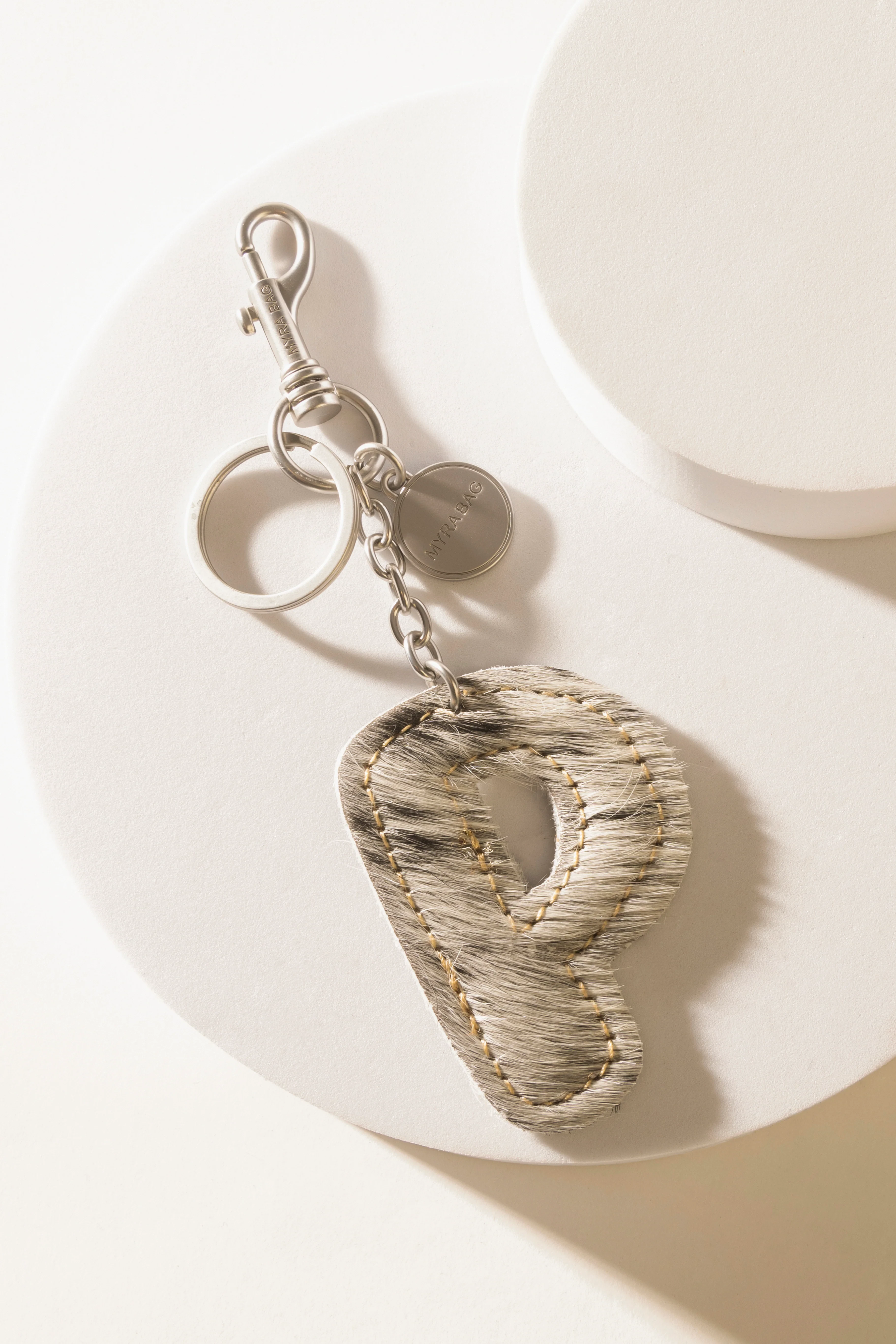 337-alpha-hairon-bag-charm-in-black-white-1.webp
