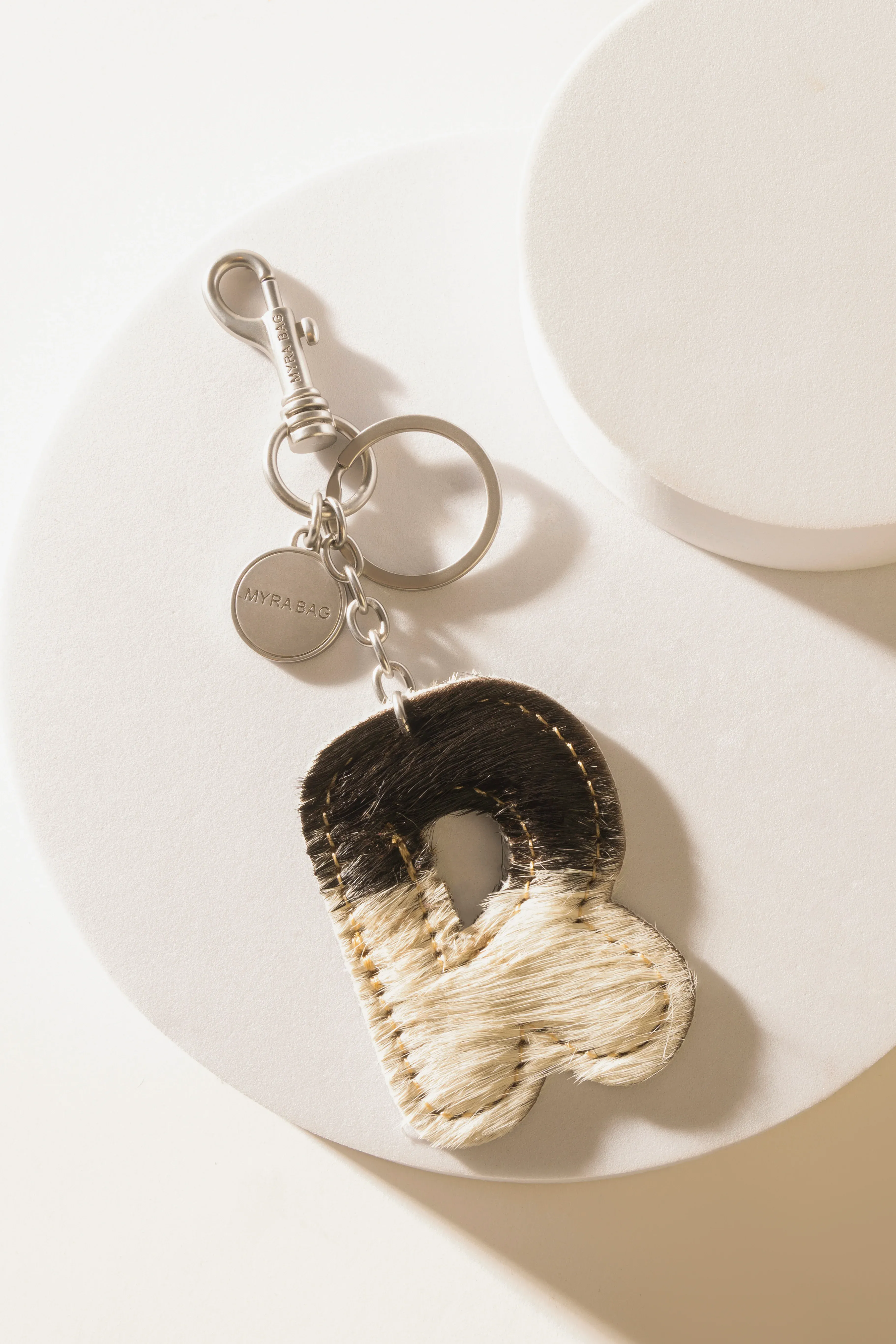 337-alpha-hairon-bag-charm-in-black-white-1.webp