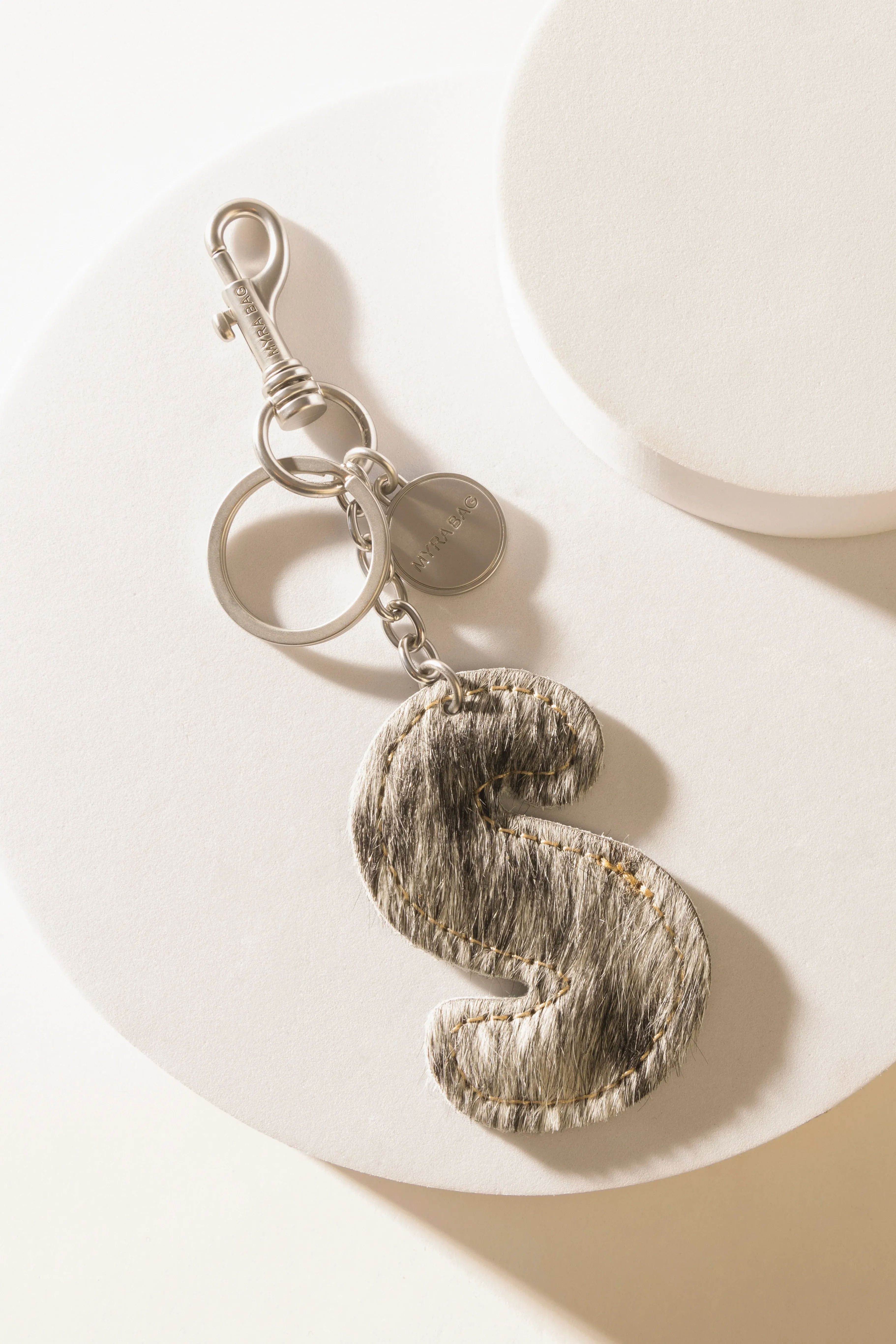 337-alpha-hairon-bag-charm-in-black-white-1.webp