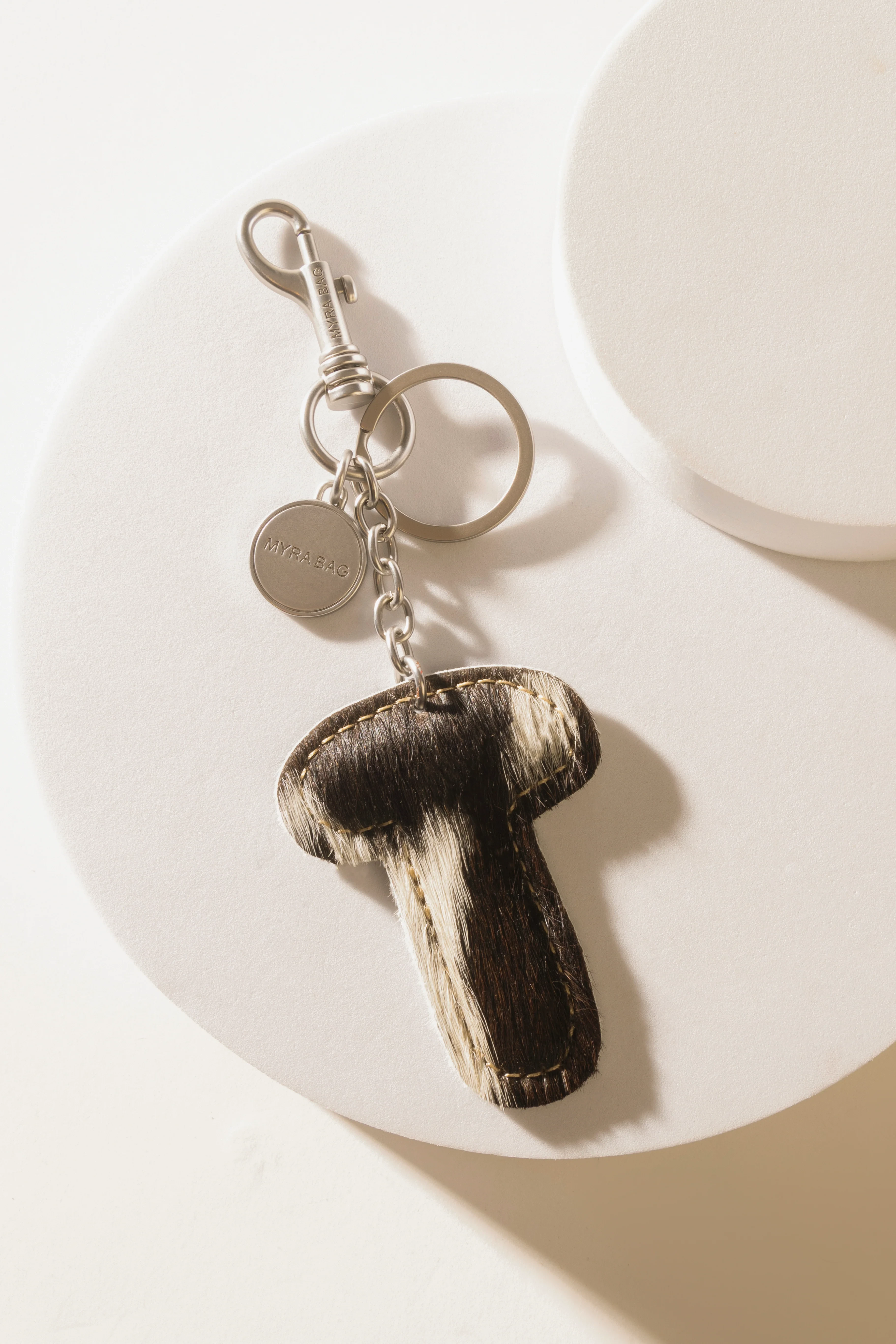 337-alpha-hairon-bag-charm-in-black-white-1.webp