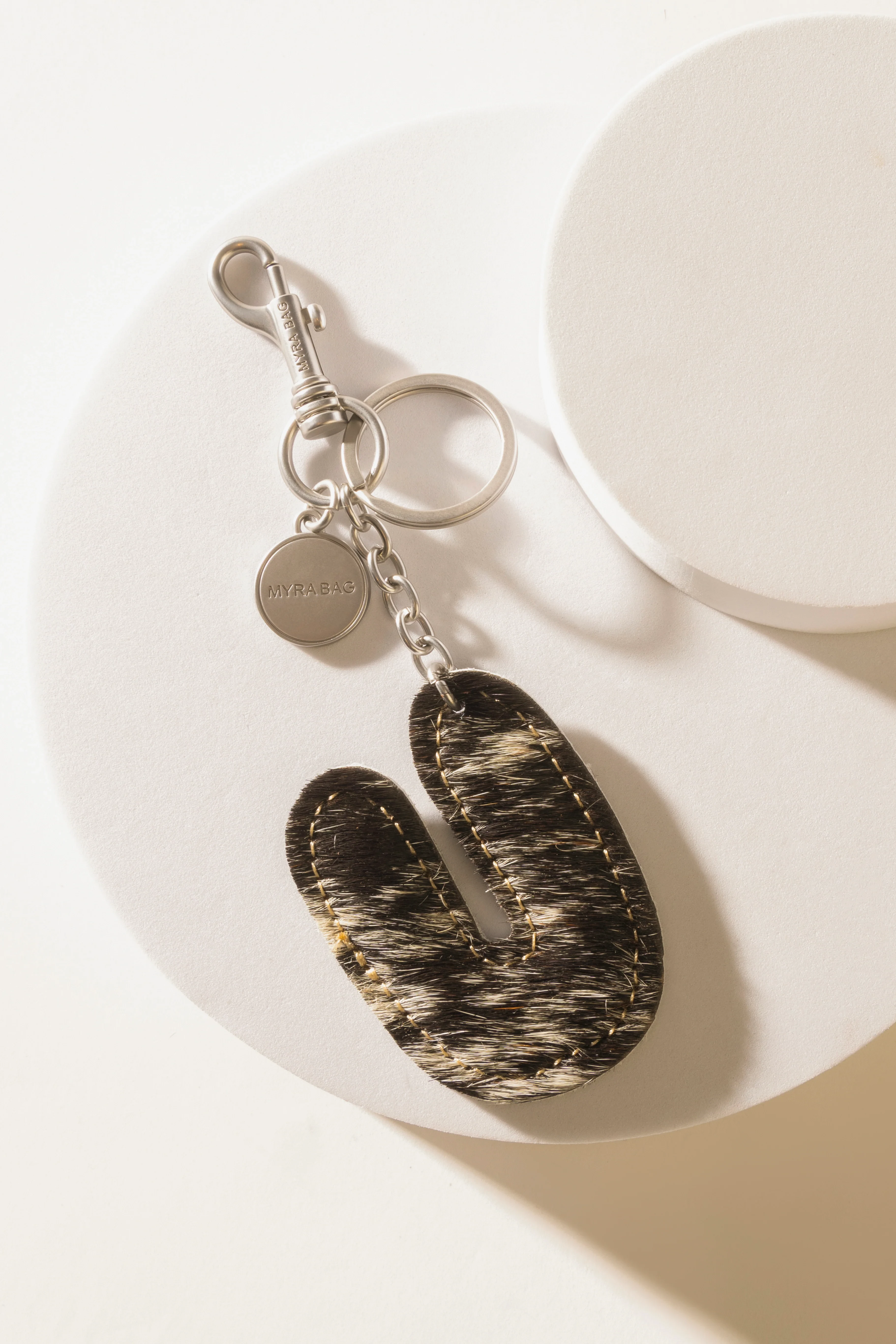 337-alpha-hairon-bag-charm-in-black-white-1.webp