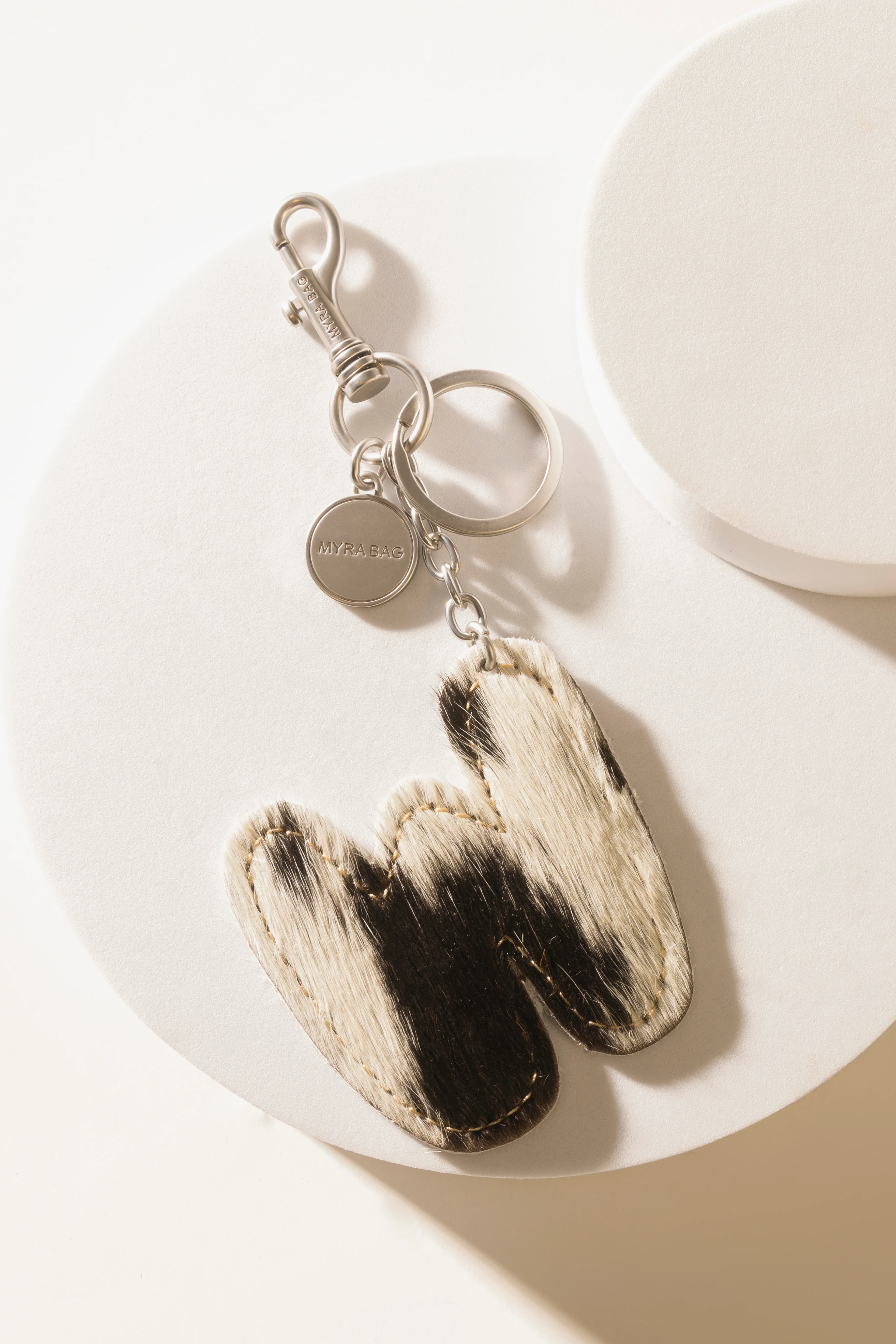 337-alpha-hairon-bag-charm-in-black-white-1.webp