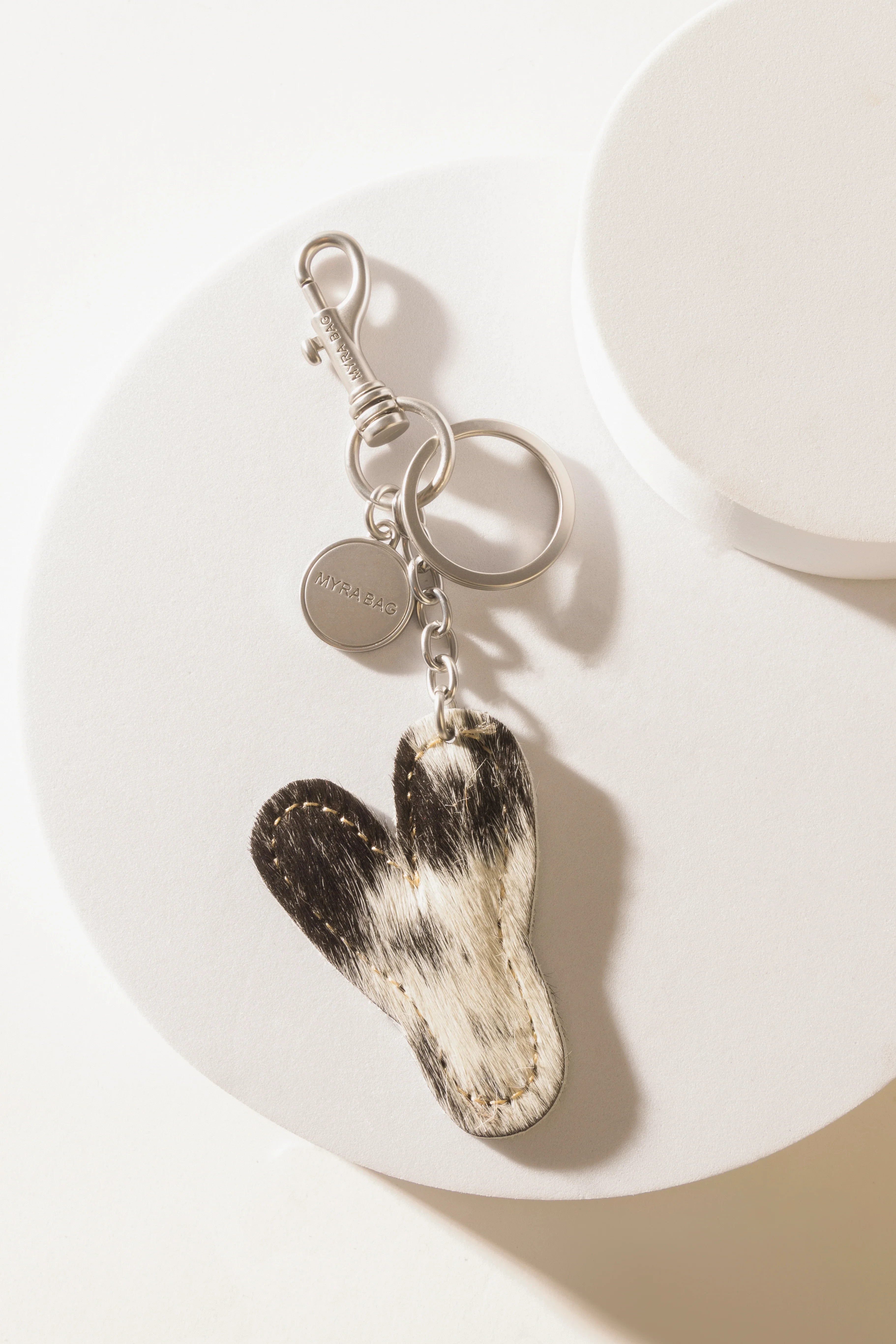 337-alpha-hairon-bag-charm-in-black-white-1.webp