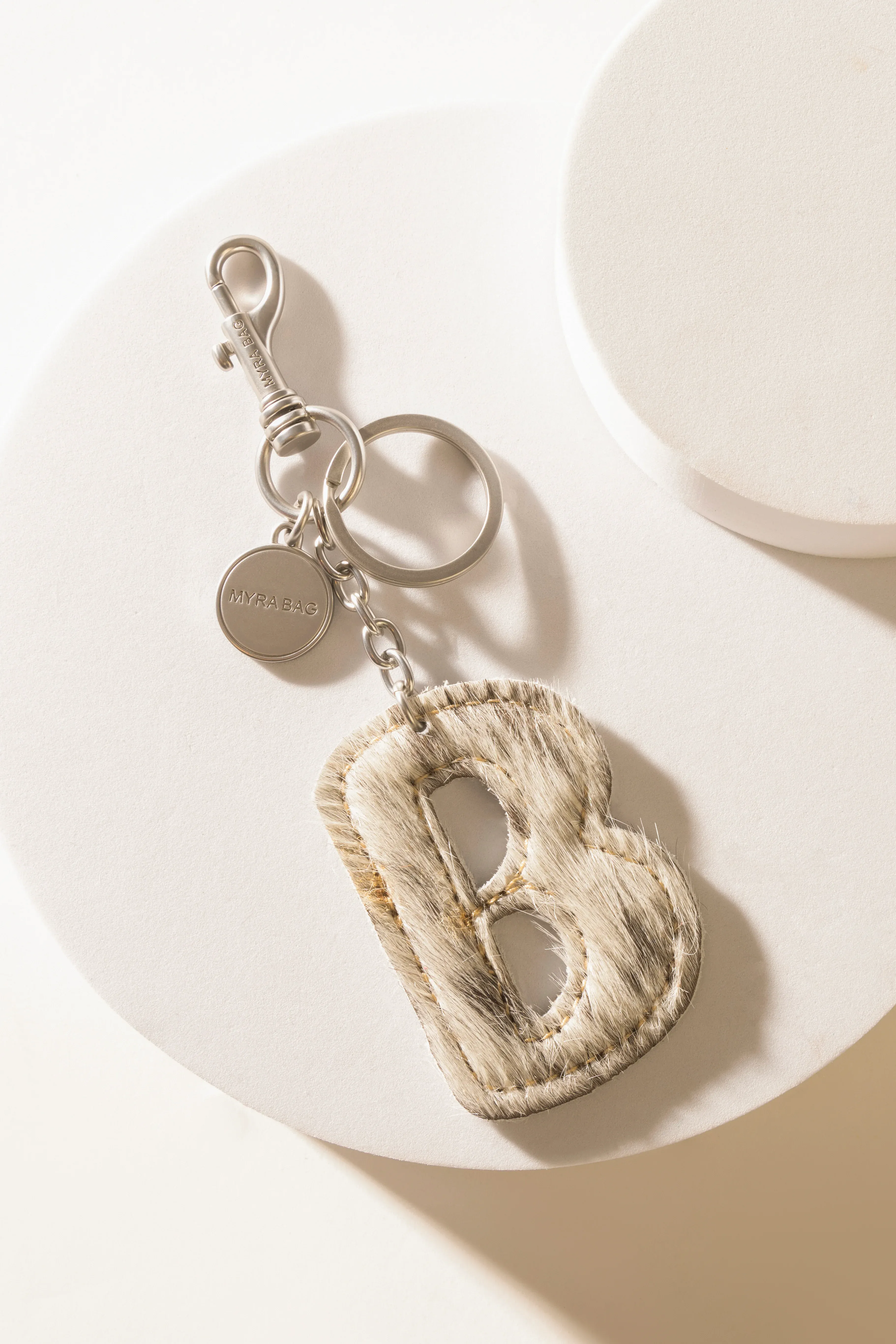 337-alpha-hairon-bag-charm-in-black-white-1.webp
