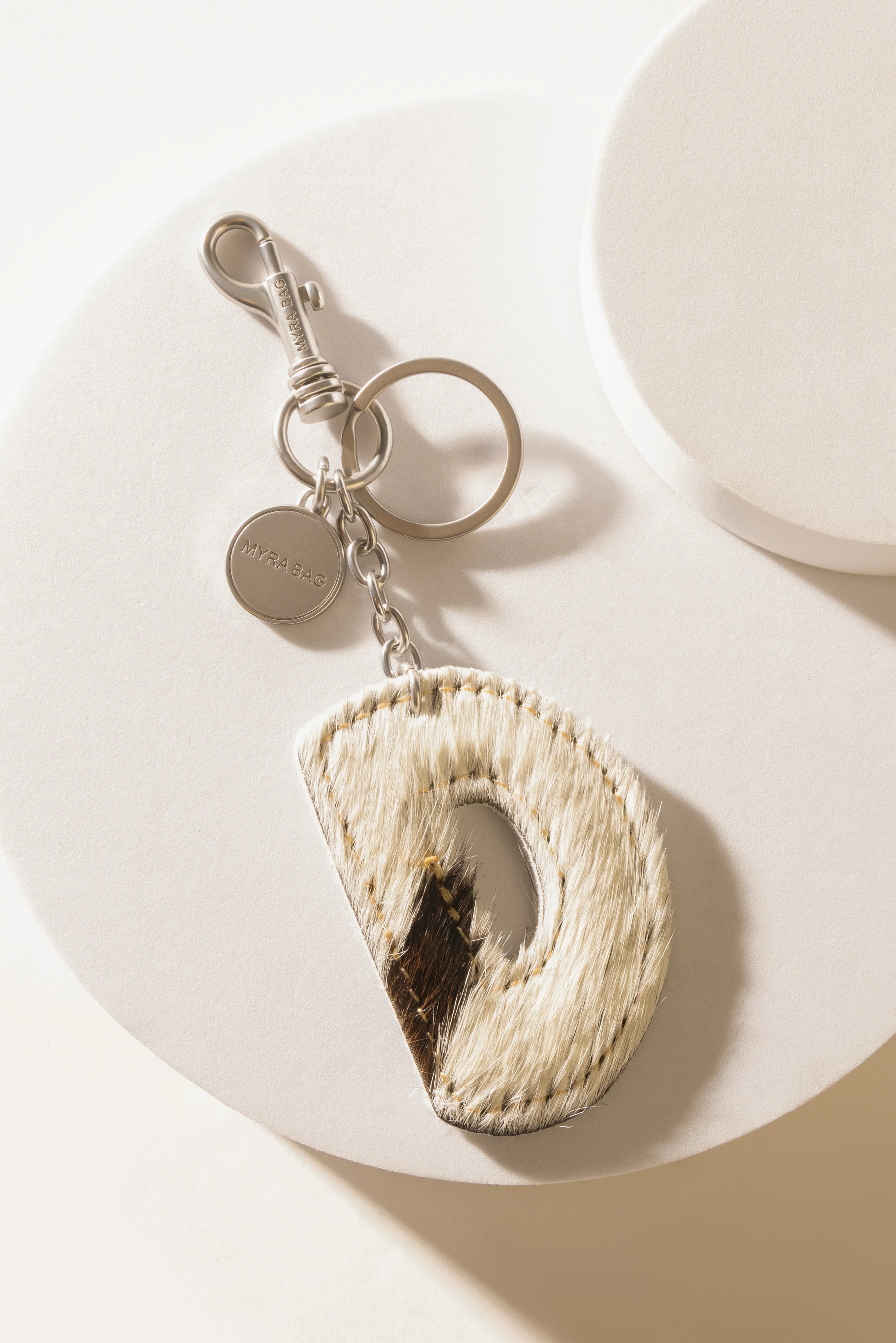 337-alpha-hairon-bag-charm-in-black-white-1.webp