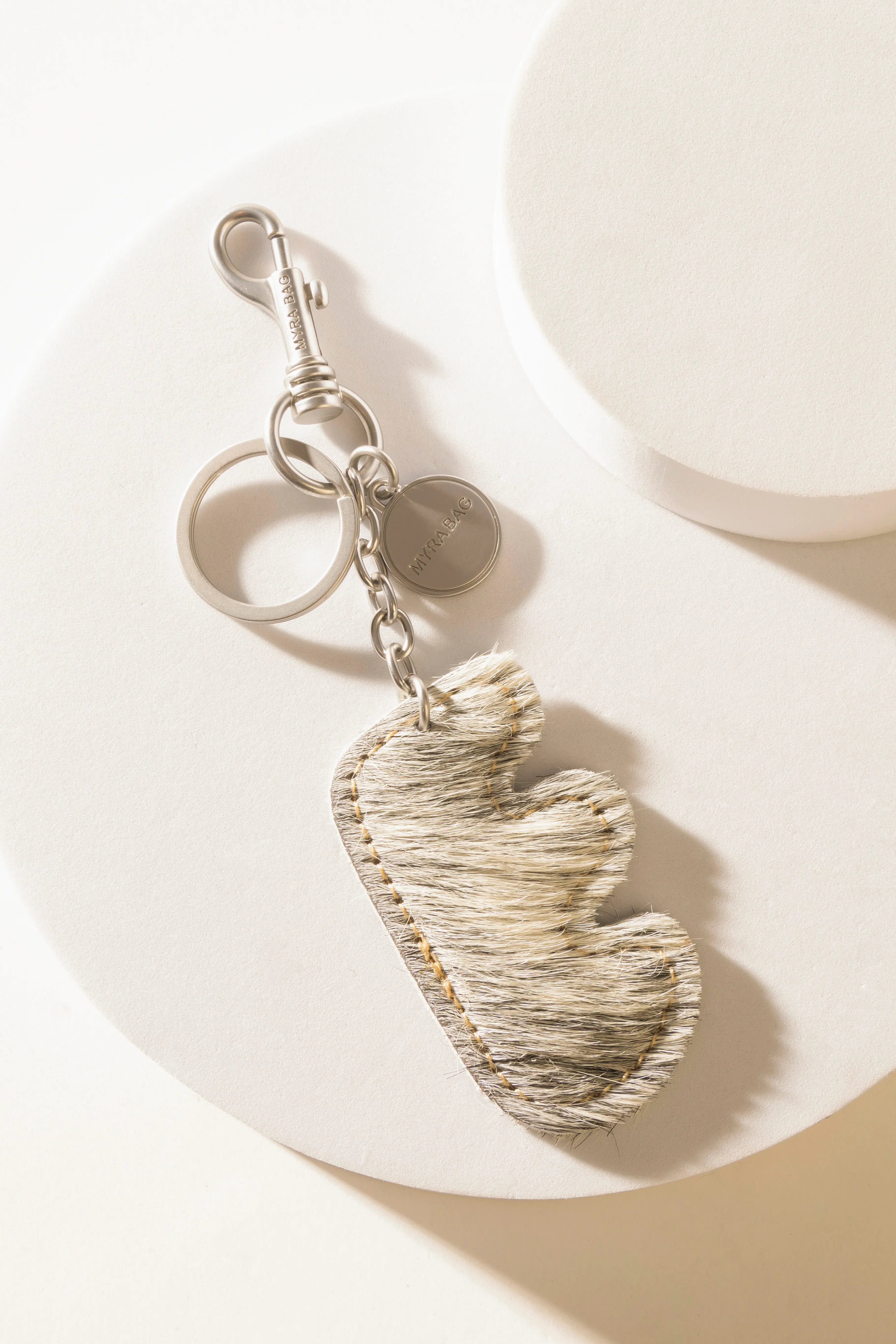 337-alpha-hairon-bag-charm-in-black-white-1.webp