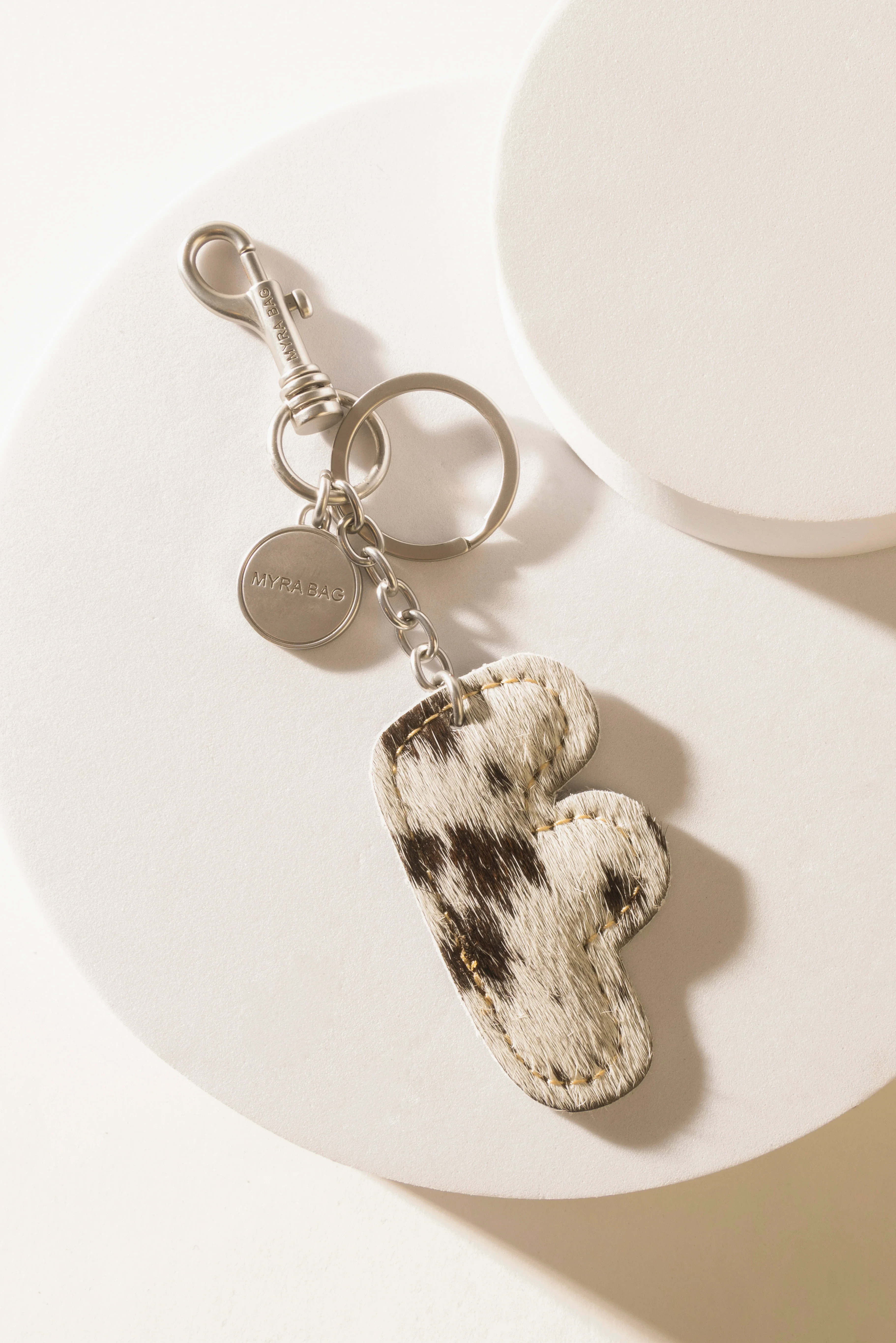 337-alpha-hairon-bag-charm-in-black-white-1.webp