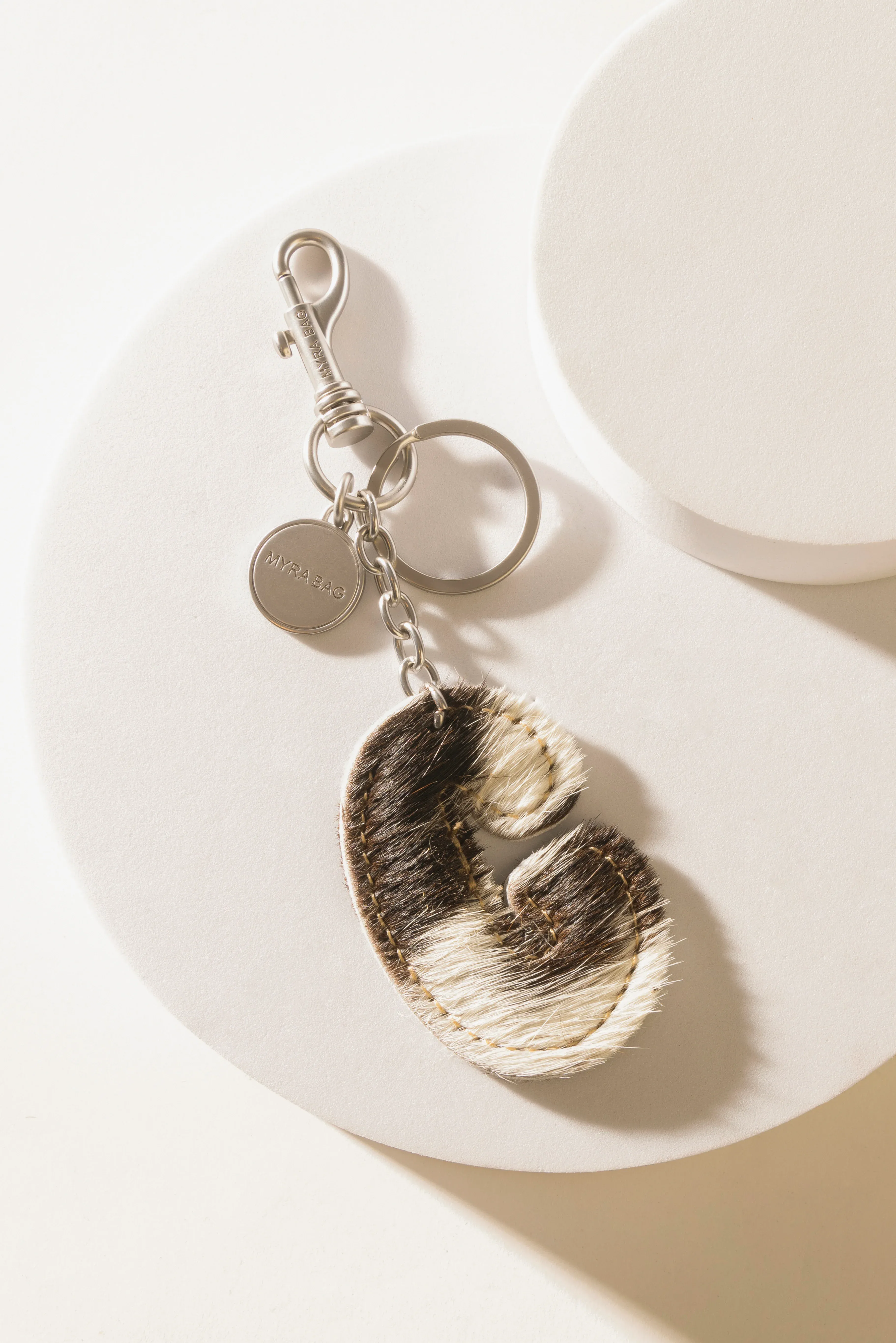 337-alpha-hairon-bag-charm-in-black-white-1.webp