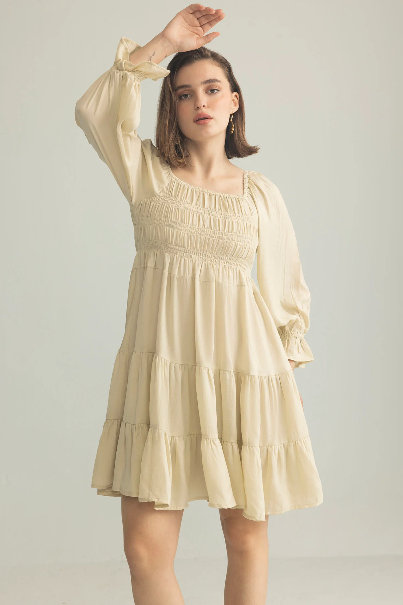 3548-daisywood-ruffle-smocking-dress-in-oatmeal-1.webp