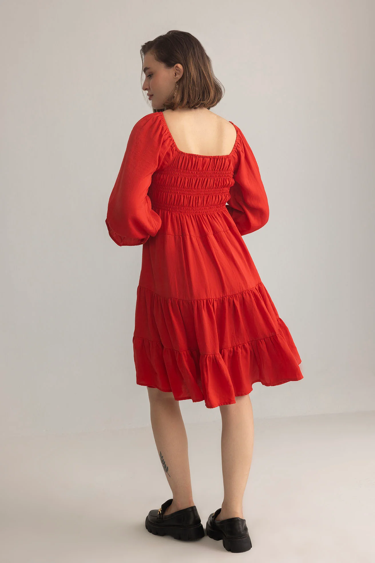 3555-daisywood-ruffle-smocking-dress-in-red-1.webp