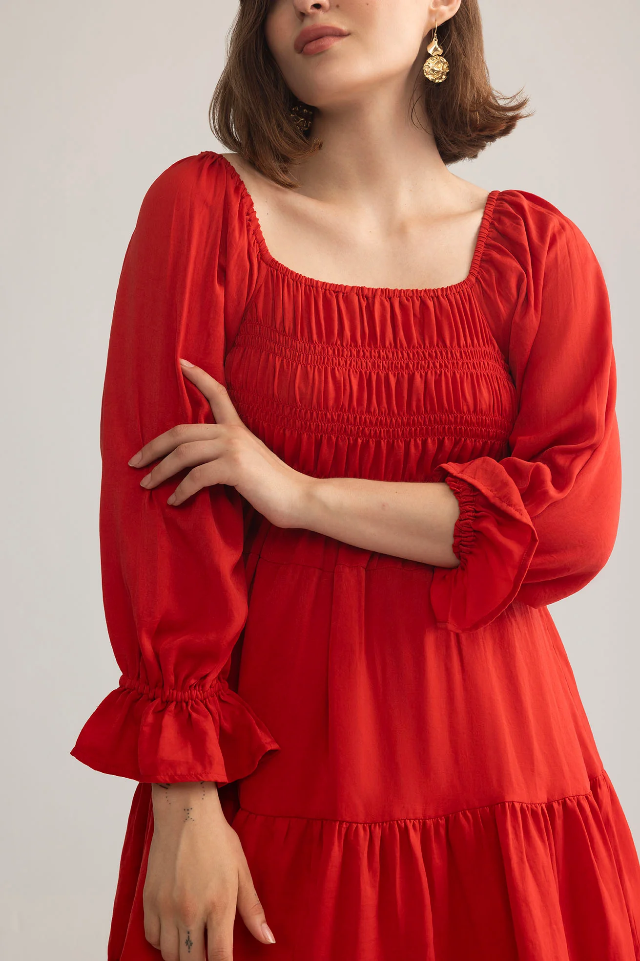 3555-daisywood-ruffle-smocking-dress-in-red-1.webp