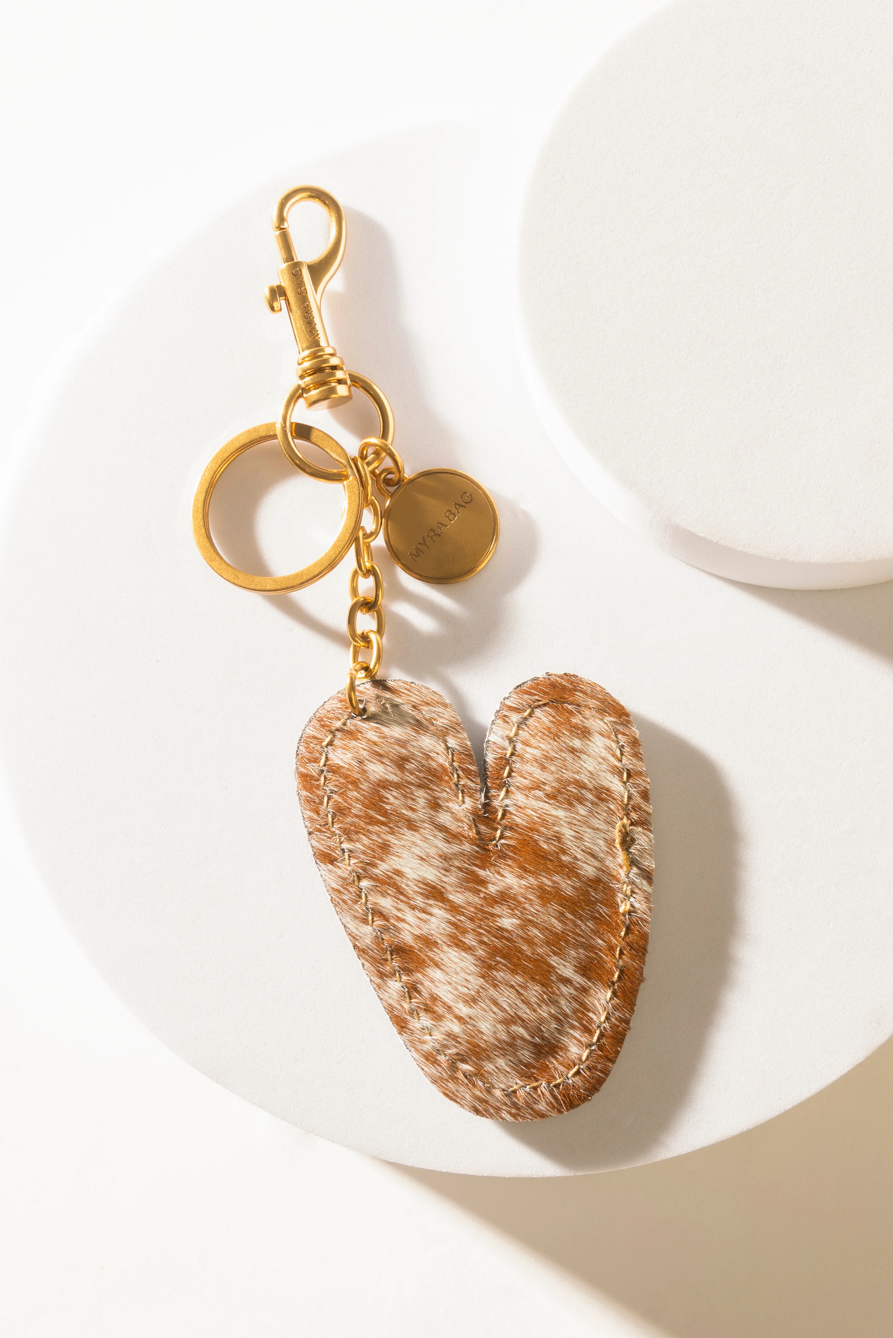 364-alpha-hairon-bag-charm-in-brown-white-1.webp