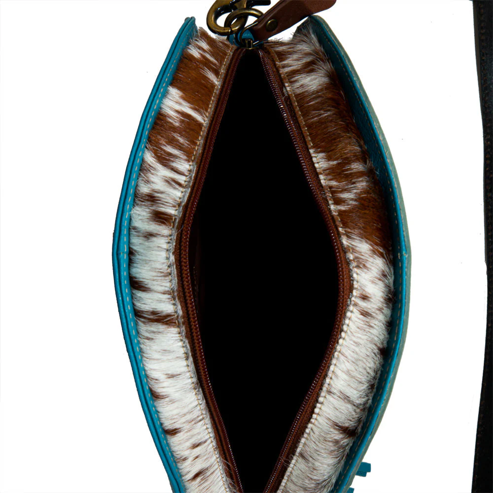 3935-desert-rain-hand-tooled-round-bag-1.webp