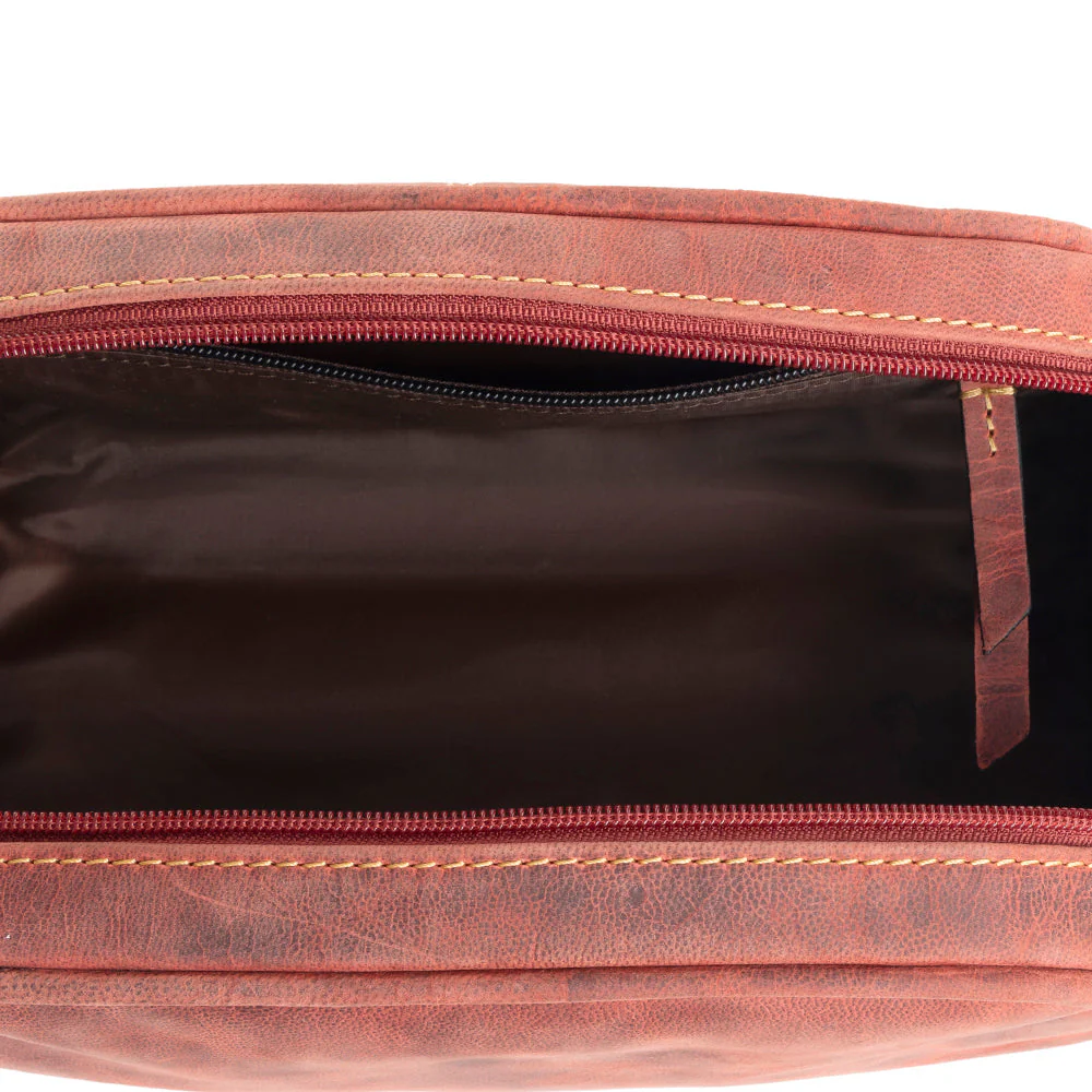 4298-eagle-s-talon-toiletries-bag-in-smoky-rust-1.webp