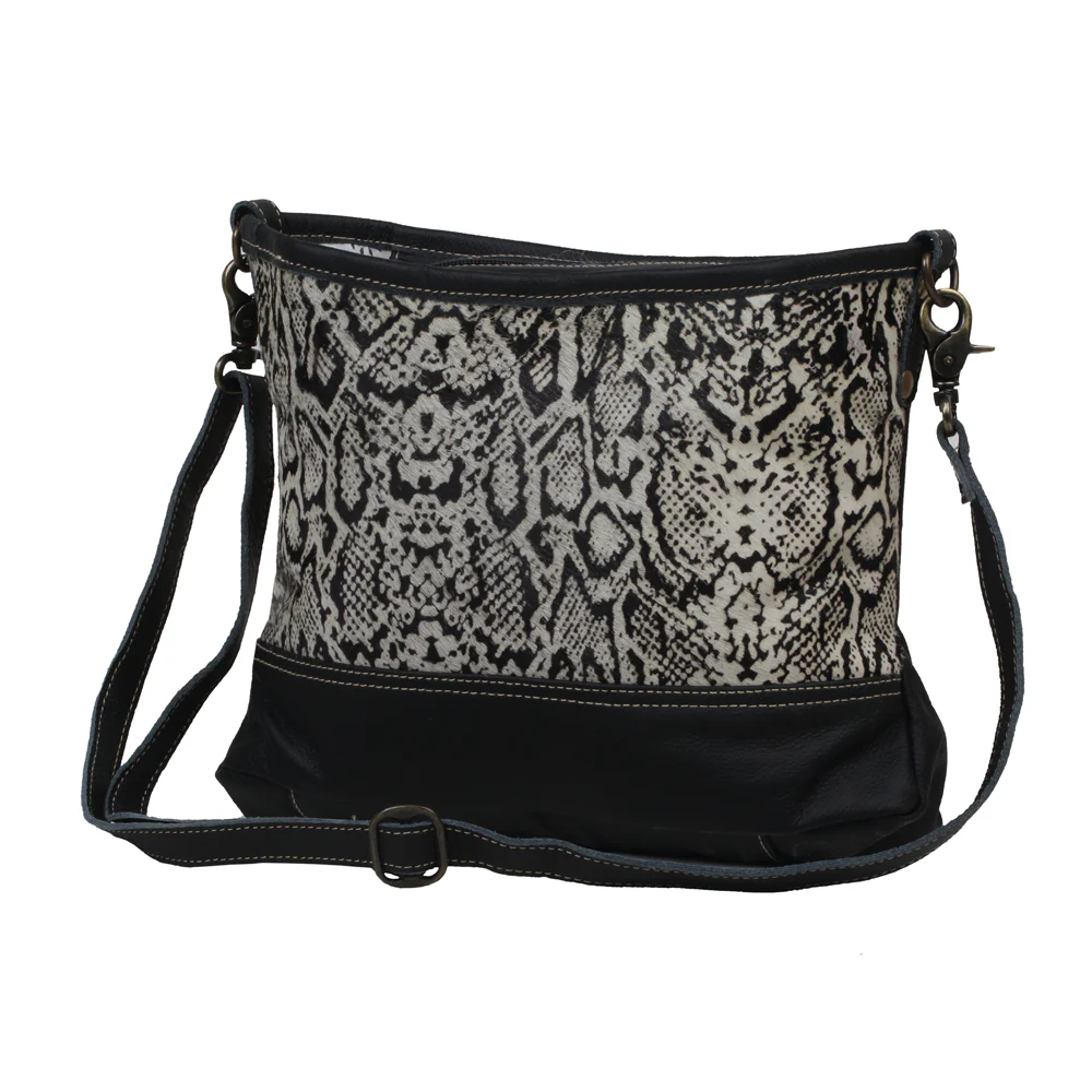 ANTIQUATED LEATHER AND HAIRON BAG