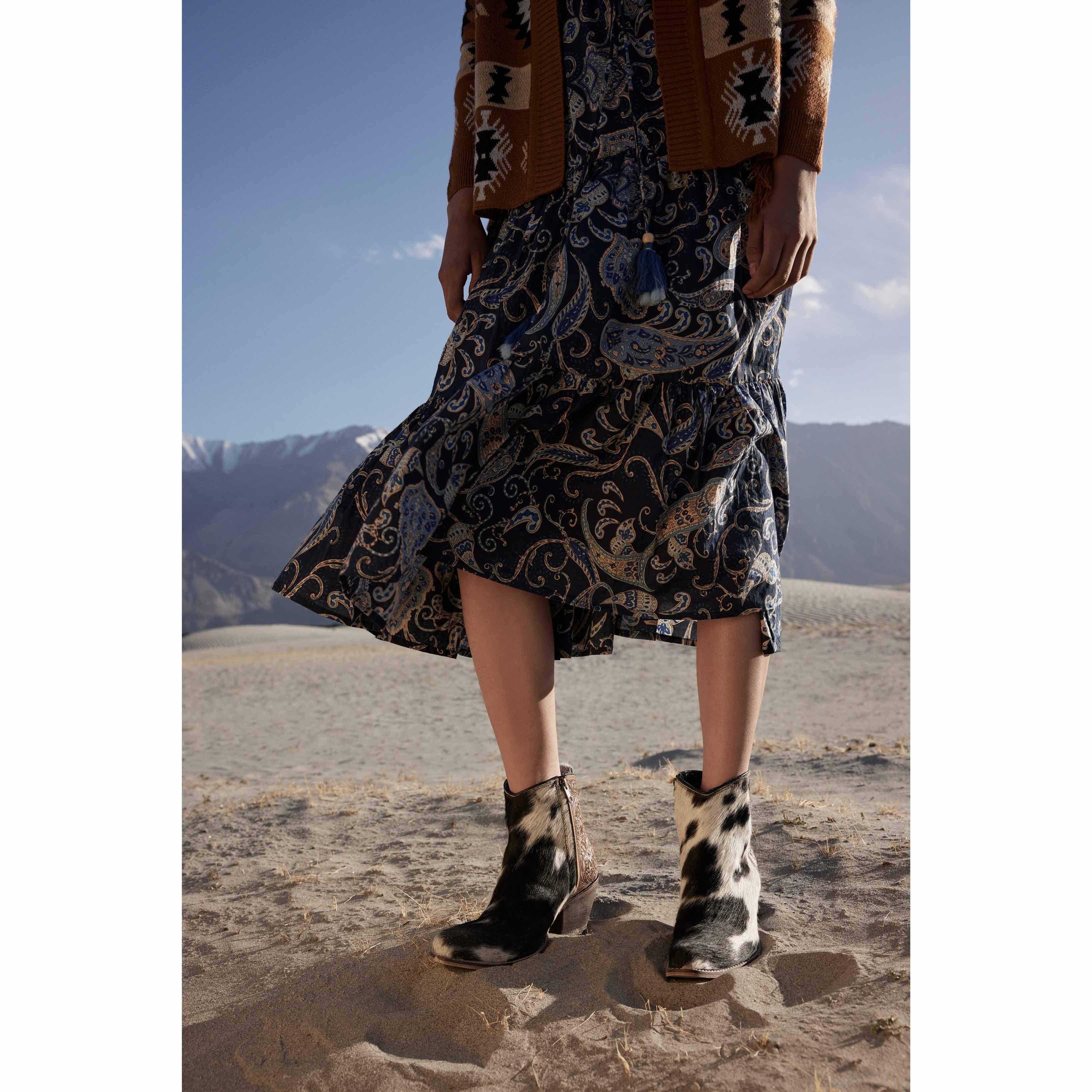7034-laramie-plains-hair-on-hide-hand-tooled-boots-1.webp