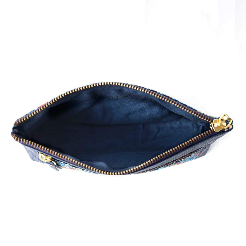 7420-lovely-garden-walls-clutch-bag-in-blue-1.webp