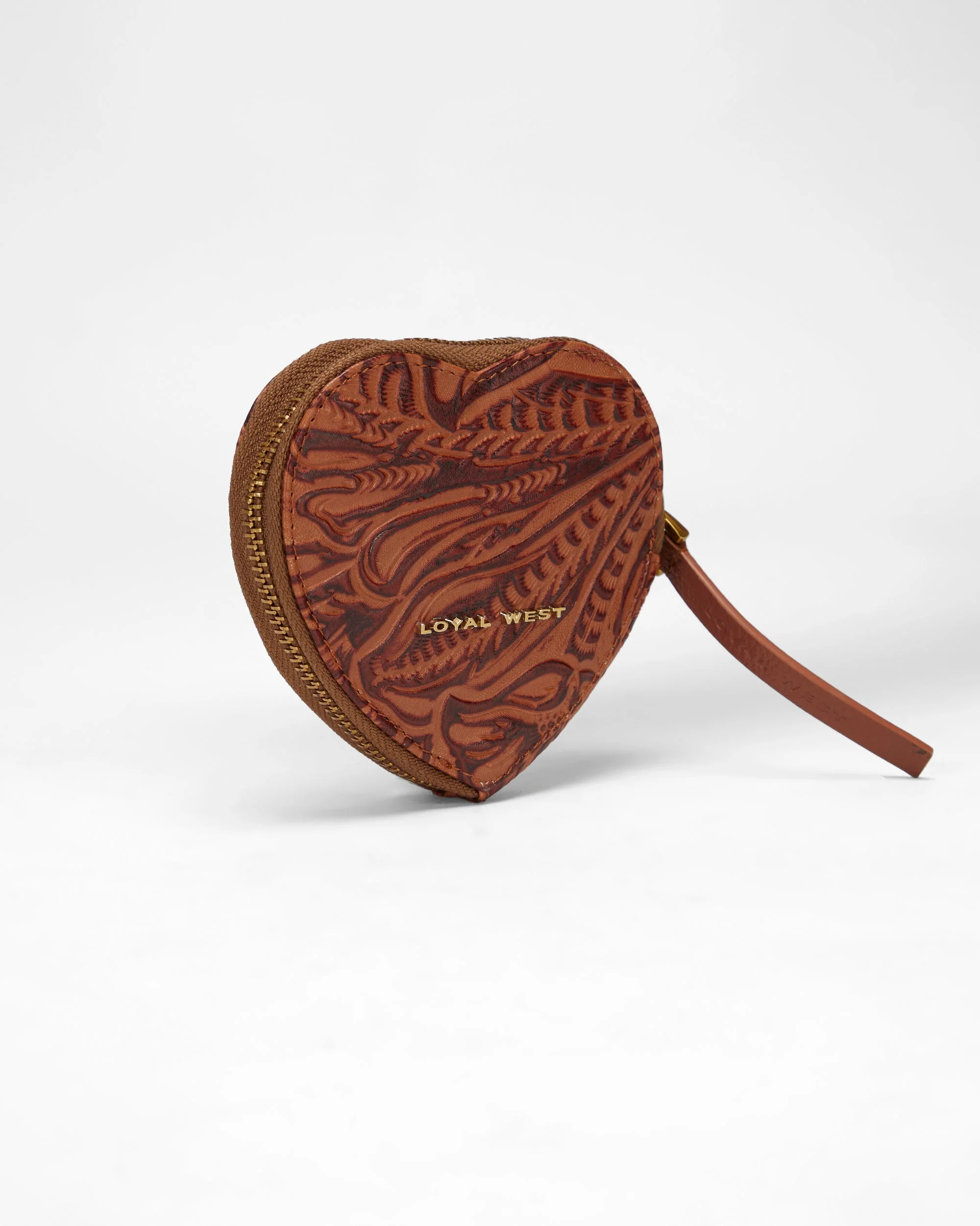 7534-loyal-west-cupid-coin-pouch-in-hand-finished-embossed-leather-brown-1.webp