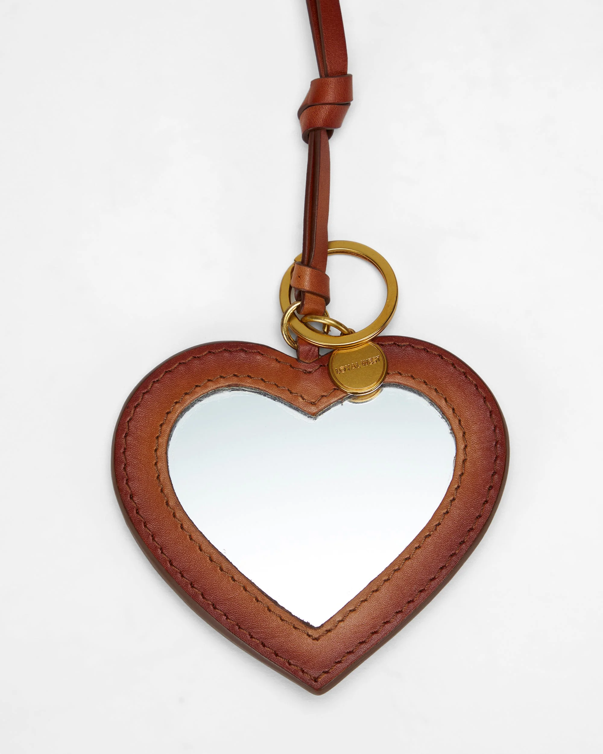 7632-loyal-west-heart-shape-bag-charm-in-handtooled-leather-1.webp