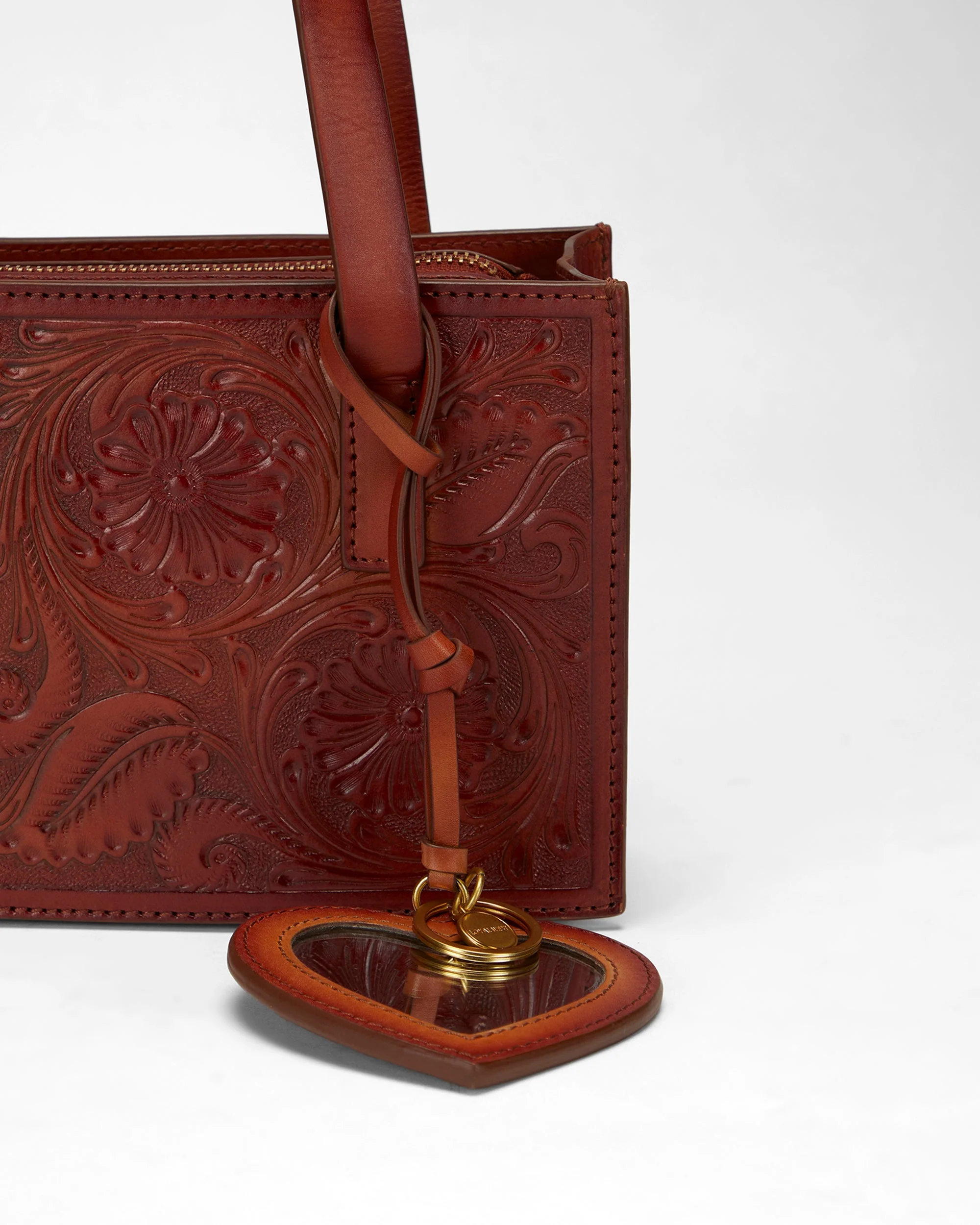 7632-loyal-west-heart-shape-bag-charm-in-handtooled-leather-1.webp