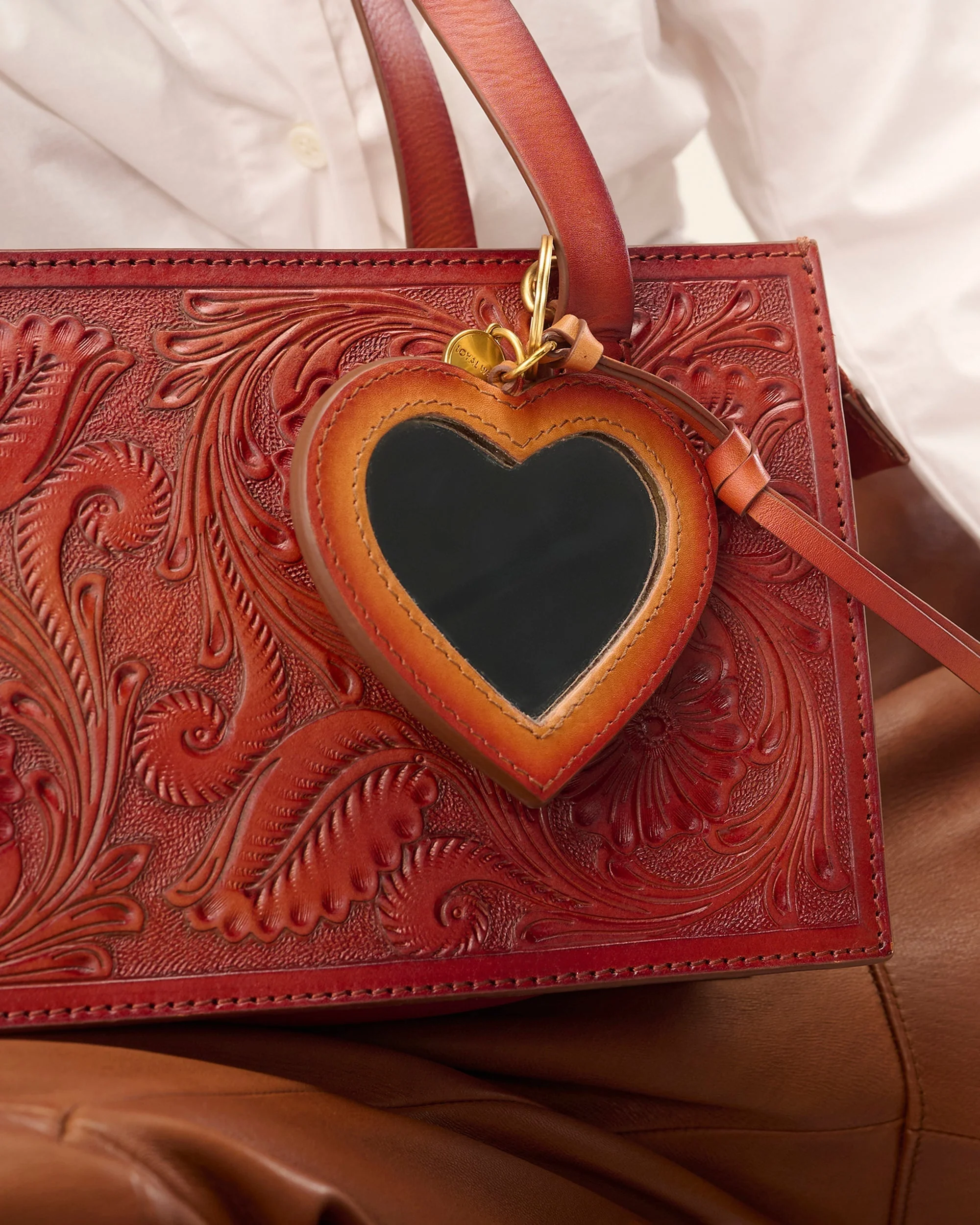 7632-loyal-west-heart-shape-bag-charm-in-handtooled-leather-1.webp