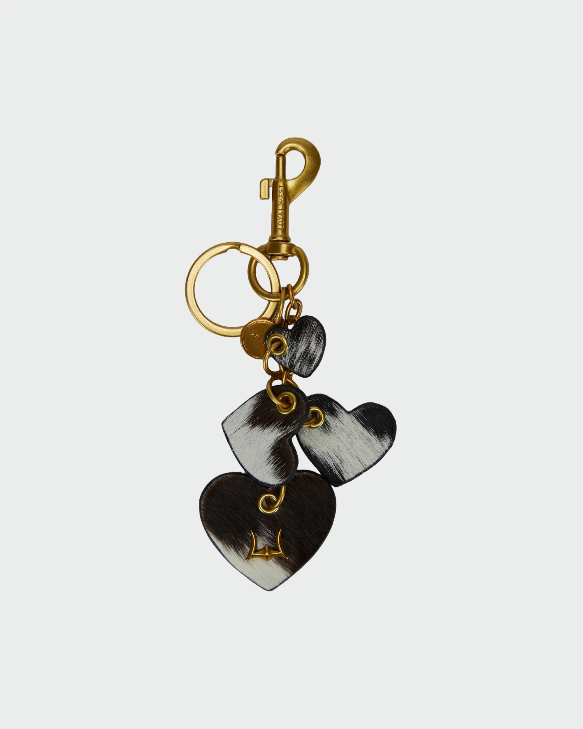 Loyal West HEART SHAPE KEYCHAIN IN BLACK & WHITE COWHIDE LEATHER 1 7633-loyal-west-heart-shape-keychain-in-black-white-cowhide-leather-1.webp