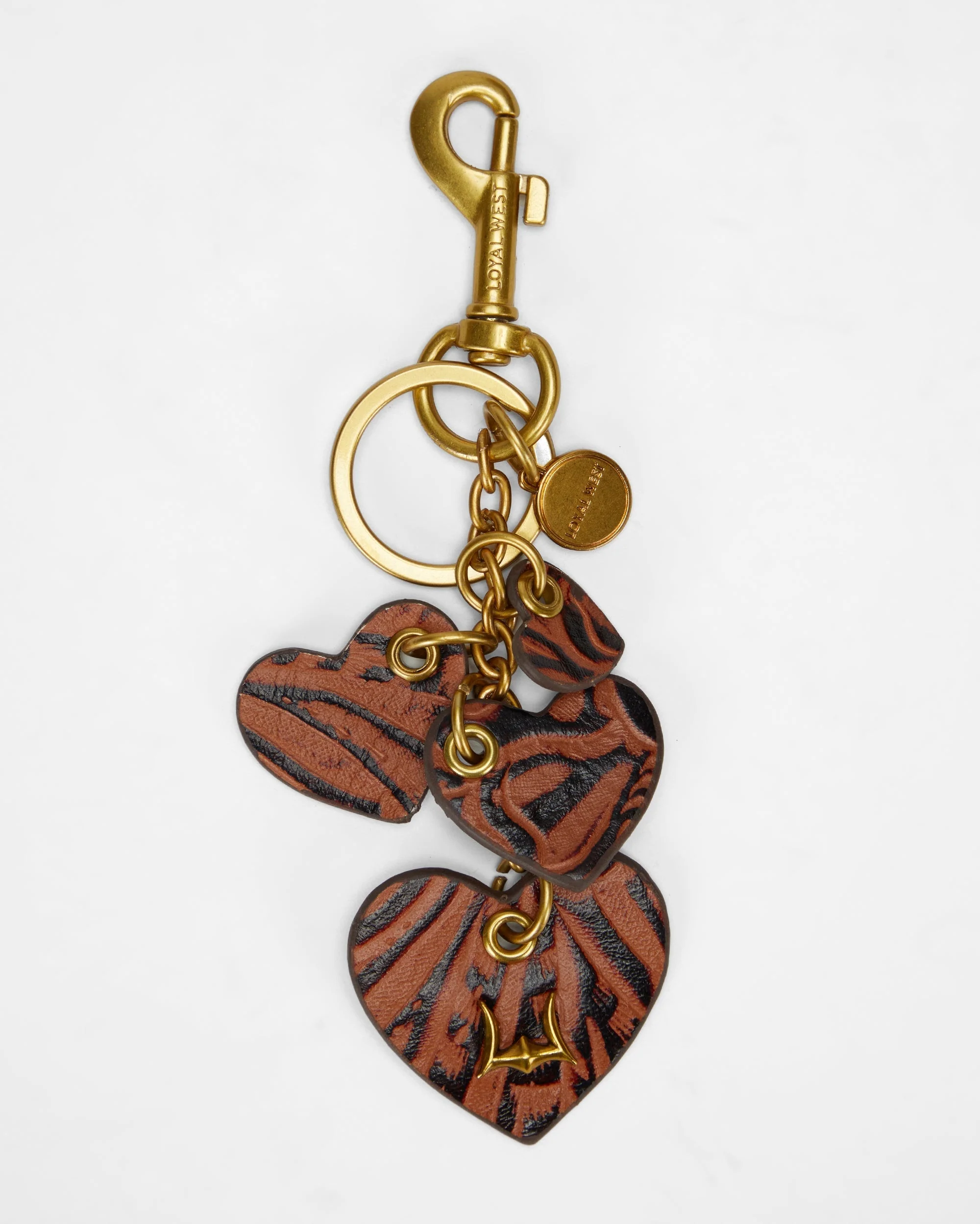 7634-loyal-west-heart-shape-keychain-in-hand-finished-embossed-leather-brown-1.webp