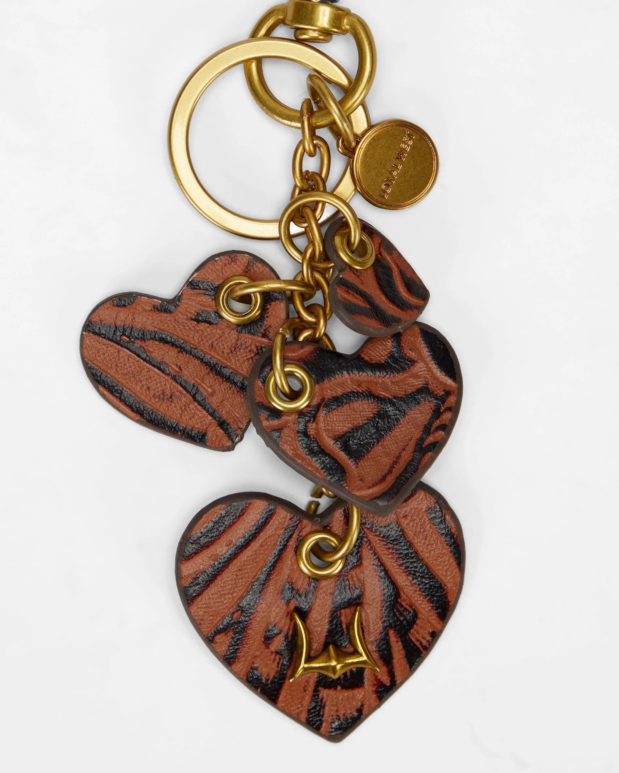 7634-loyal-west-heart-shape-keychain-in-hand-finished-embossed-leather-brown-1.webp