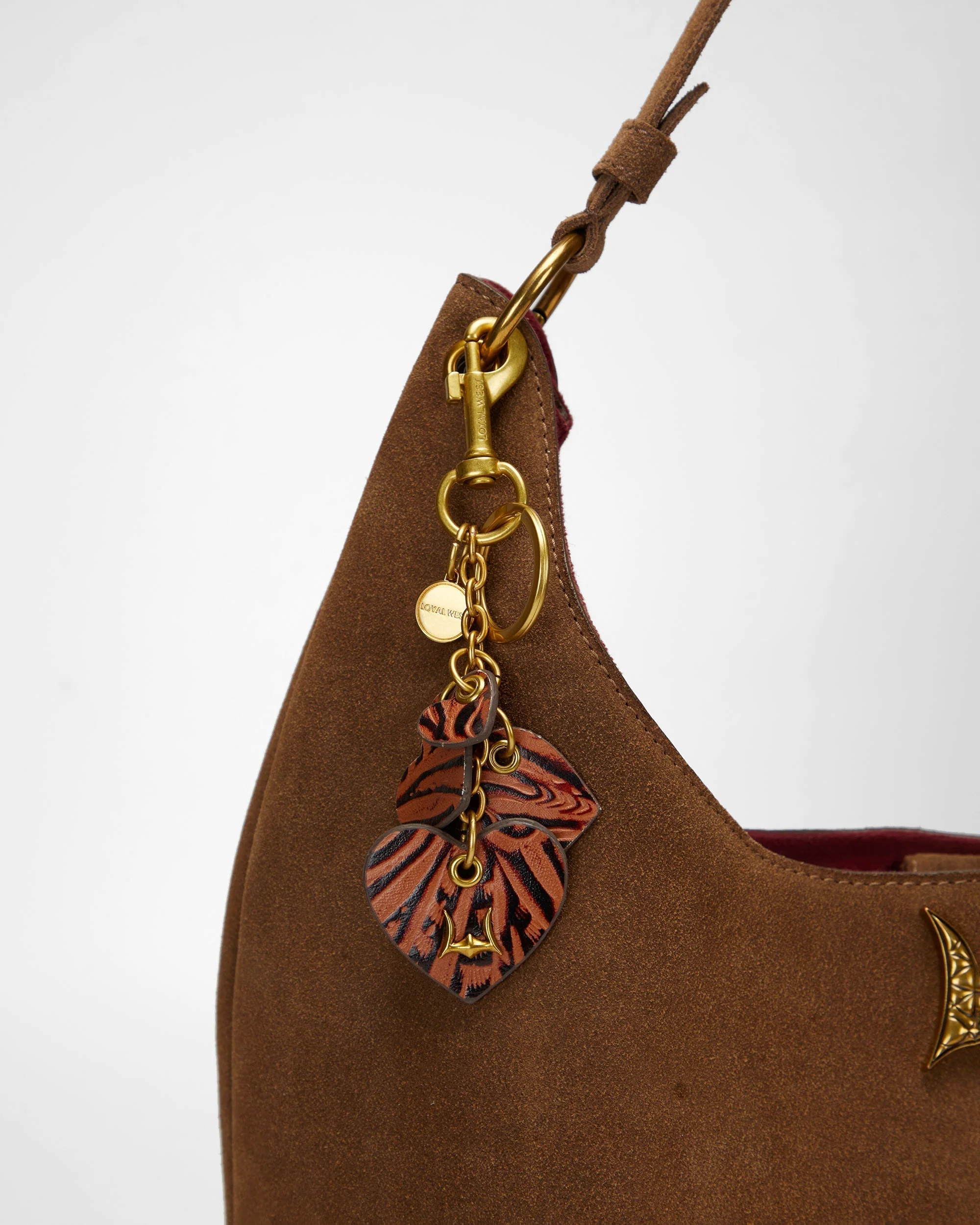 7634-loyal-west-heart-shape-keychain-in-hand-finished-embossed-leather-brown-1.webp